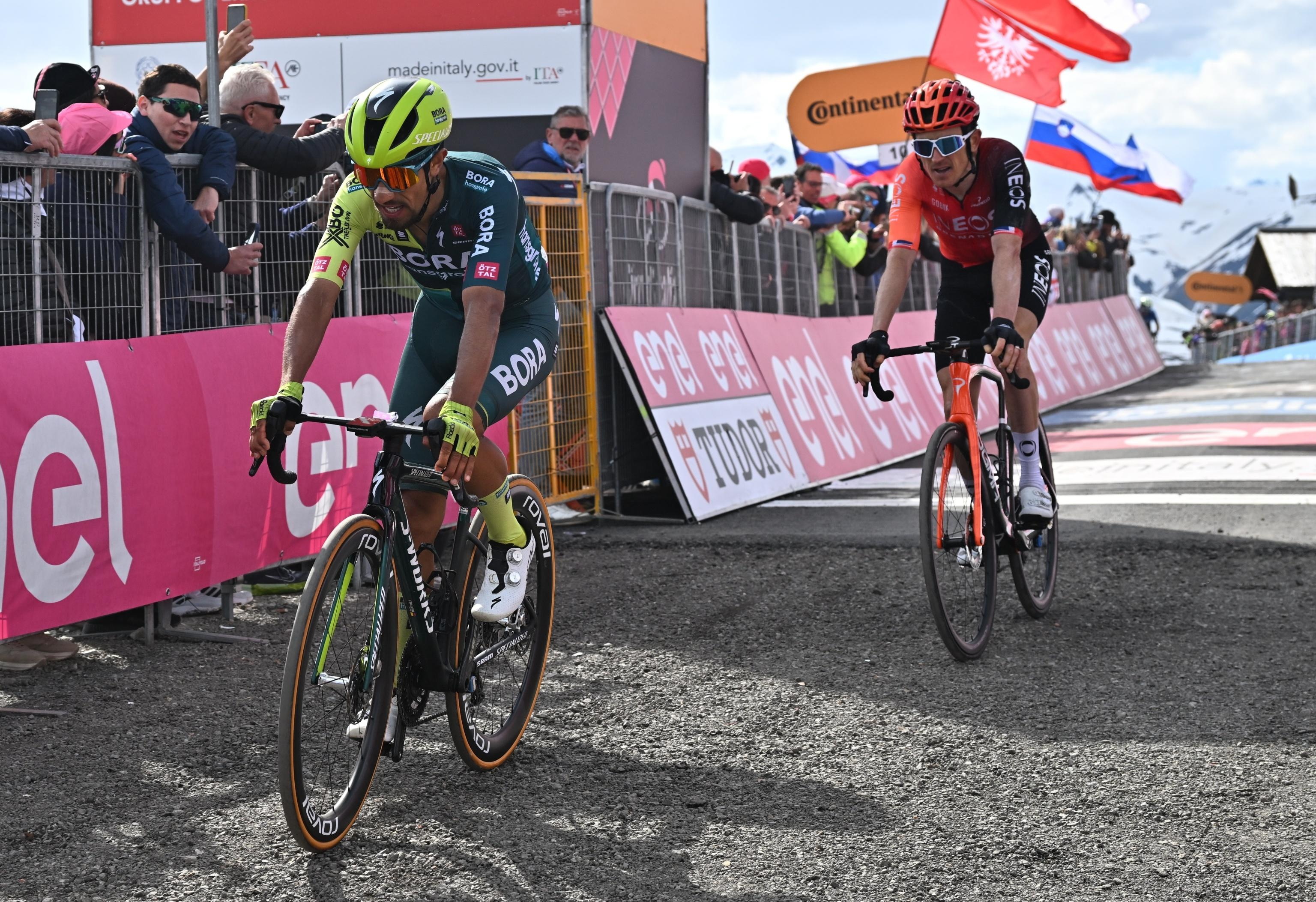Livigno (Italy), 19/05/2024.- Colombian rider Daniel Felipe Martinez of Bora Hansgrohe team and British rider Gerent Thomas of Ineos Grenadiers team react after crossing the finish line of the 15th stage of the 107th Giro d'Italia 2024 cycling tour, over 222 km from Manerba del Garda to Livigno, Italy, 19 May 2024. (Ciclismo, Italia) EFE/EPA/LUCA ZENNARO