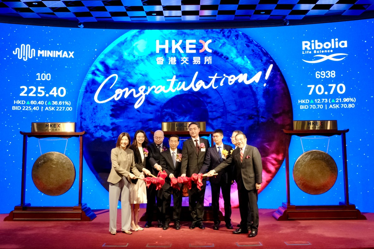 Companies' executives from Chinese AI startup MiniMax, medical products manufacture Suzhou Ribo Life Science, and non-ferrous metal processor Yunnan Jinxun Resources, attend the initial public offering (IPO) launch at the Hong Kong stock exchange on January 9, 2026.