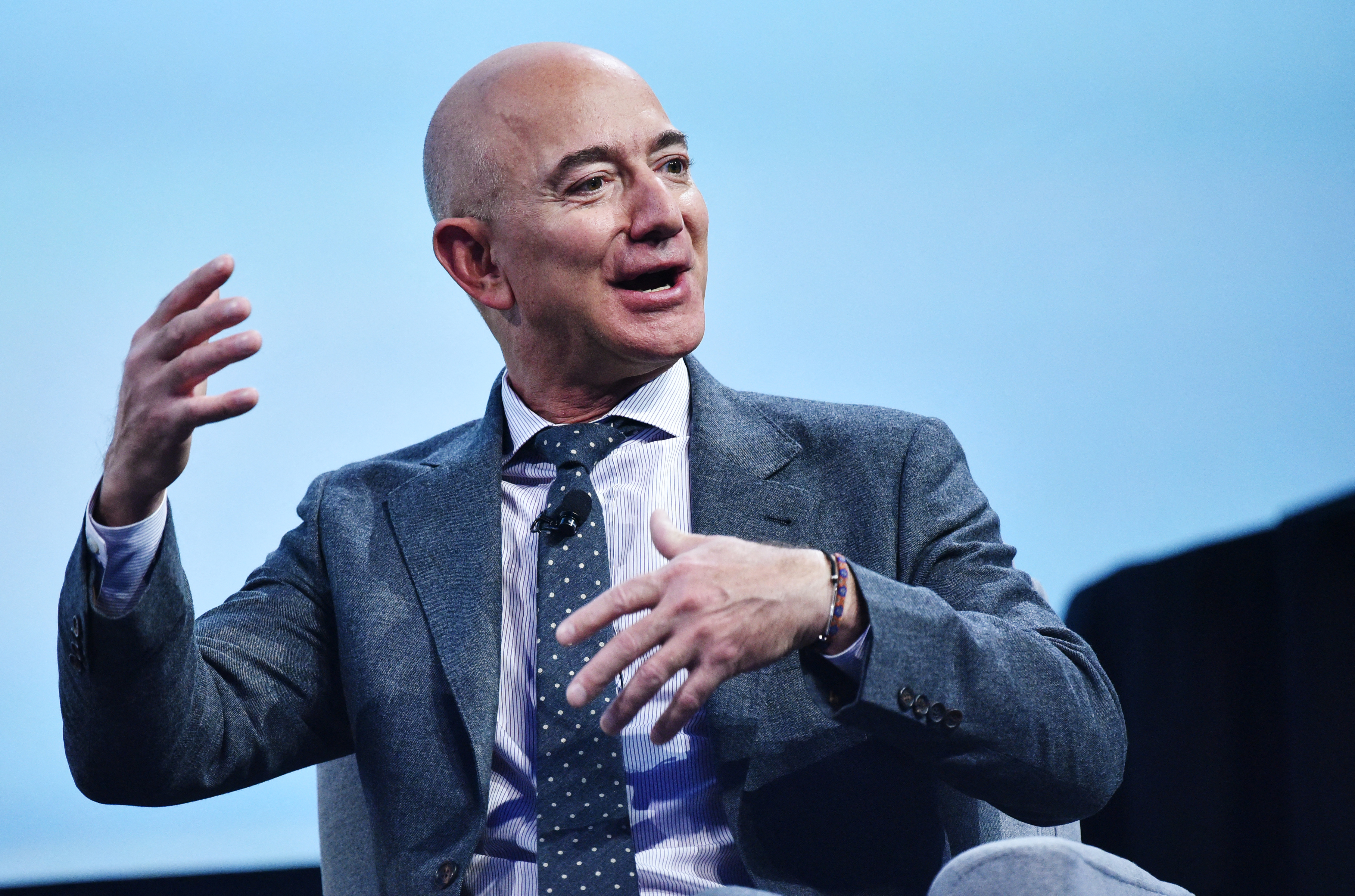(FILES) Blue Origin founder Jeff Bezos speaks after receiving the 2019 International Astronautical Federation (IAF) Excellence in Industry Award during the the 70th International Astronautical Congress at the Walter E. Washington Convention Center in Washington, DC on October 22, 2019.