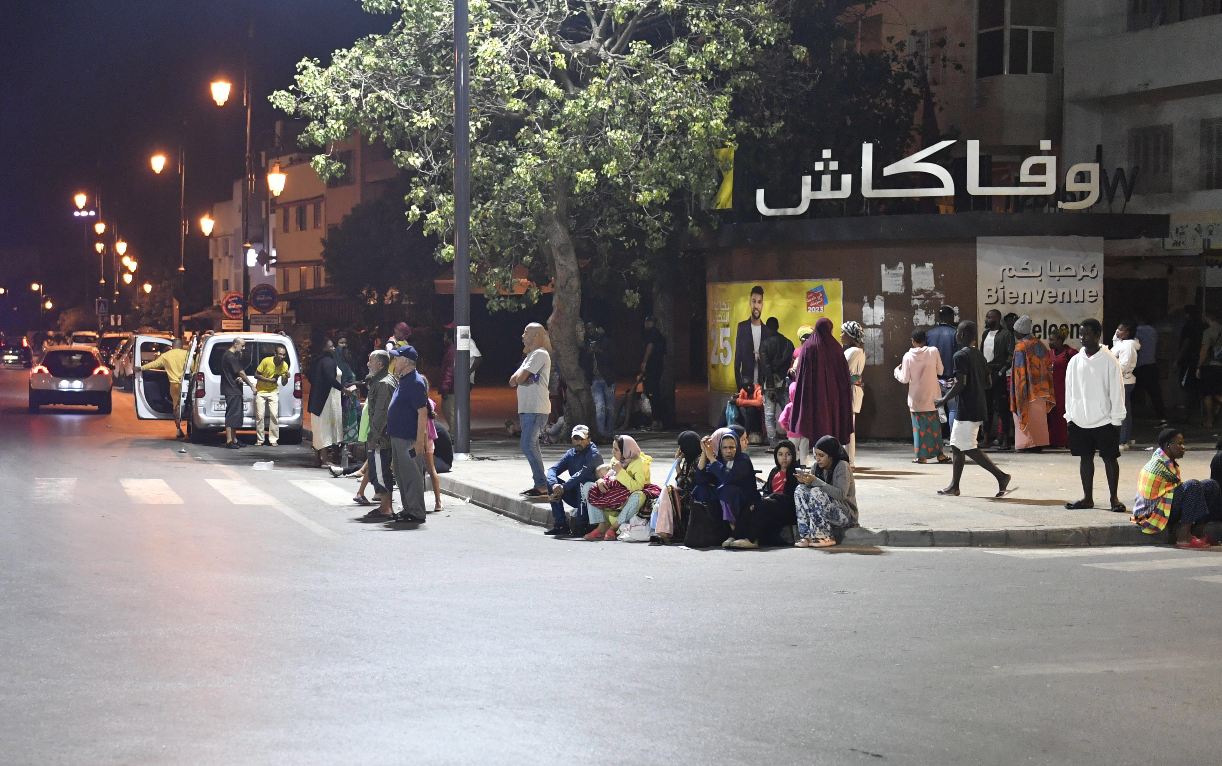Rabat (Morocco), 08/09/2023.- People seek safety outside after an earthquake in Rabat, Morocco, 08 September 2023. A 6.8-magnitude earthquake struck Morocco late 08 September, damaging buildings in major cities and sending panicked people pouring into streets and alleys. According to Morocco's state-run media, at least 296 people died in the earthquake in the provinces and prefectures of Al Haouz, Marrakech, Ouarzazate, Azilal, Chichaoua and Taroudant, and 153 people were injured. (Terremoto/sismo, Marruecos) EFE/EPA/Jalal Morchidi