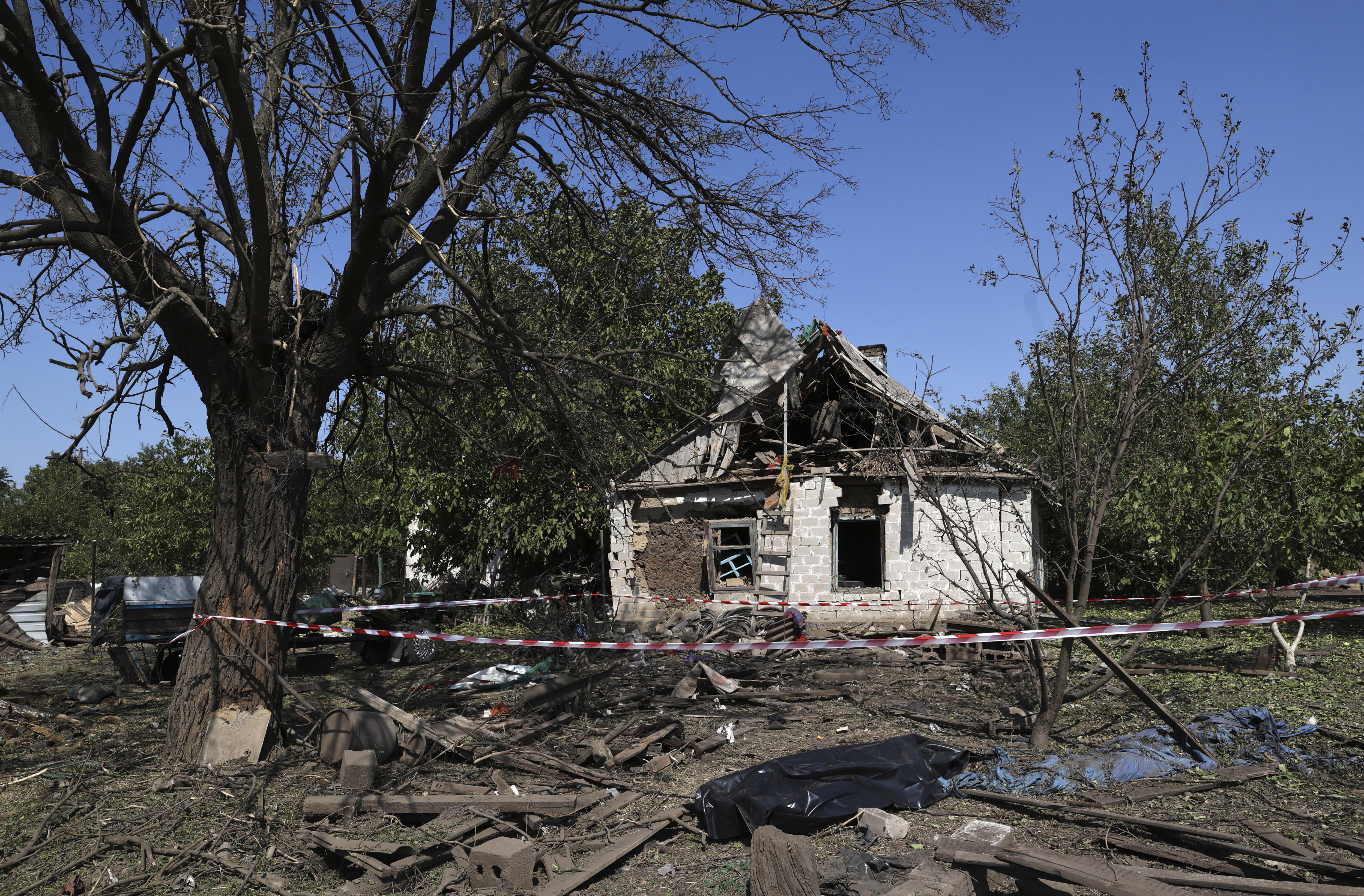 Zaporizhzhia (Ukraine), 26/08/2024.- The site of a rocket hit is seen at a village in the Zaporizhzhia area, Ukraine, 26 August 2024, after a morning of combined shelling around the entire territory of Ukraine. Ukrainian President Volodymyr Zelensky wrote on his telegram channel that Ukraine experienced a heavy Russian missile and drone attack. The attack targeted critical civilian infrastructure across the country, resulting in casualties and injuries. The Ukrainian president expressed his condolences to the victims' families and assured that injured people are receiving necessary assistance. Russian troops entered Ukrainian territory on 24 February 2022, starting a conflict that has provoked destruction and a humanitarian crisis. (Zelenski, Rusia, Ucrania) EFE/EPA/KATERYNA KLOCHKO