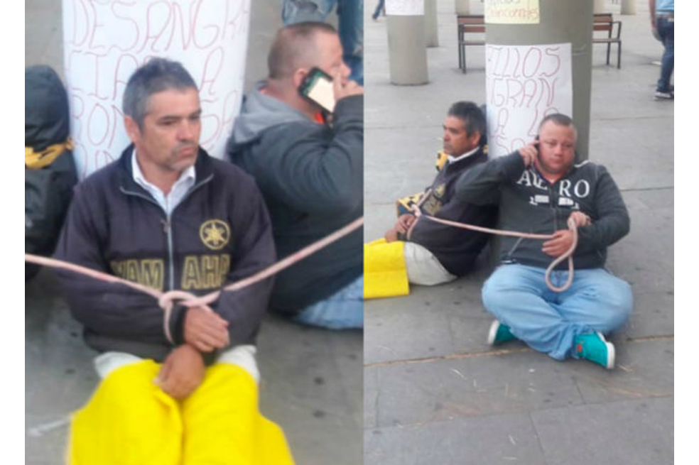 Taxistas pasaron la noche amarrados a postes para protestar en Medellín
