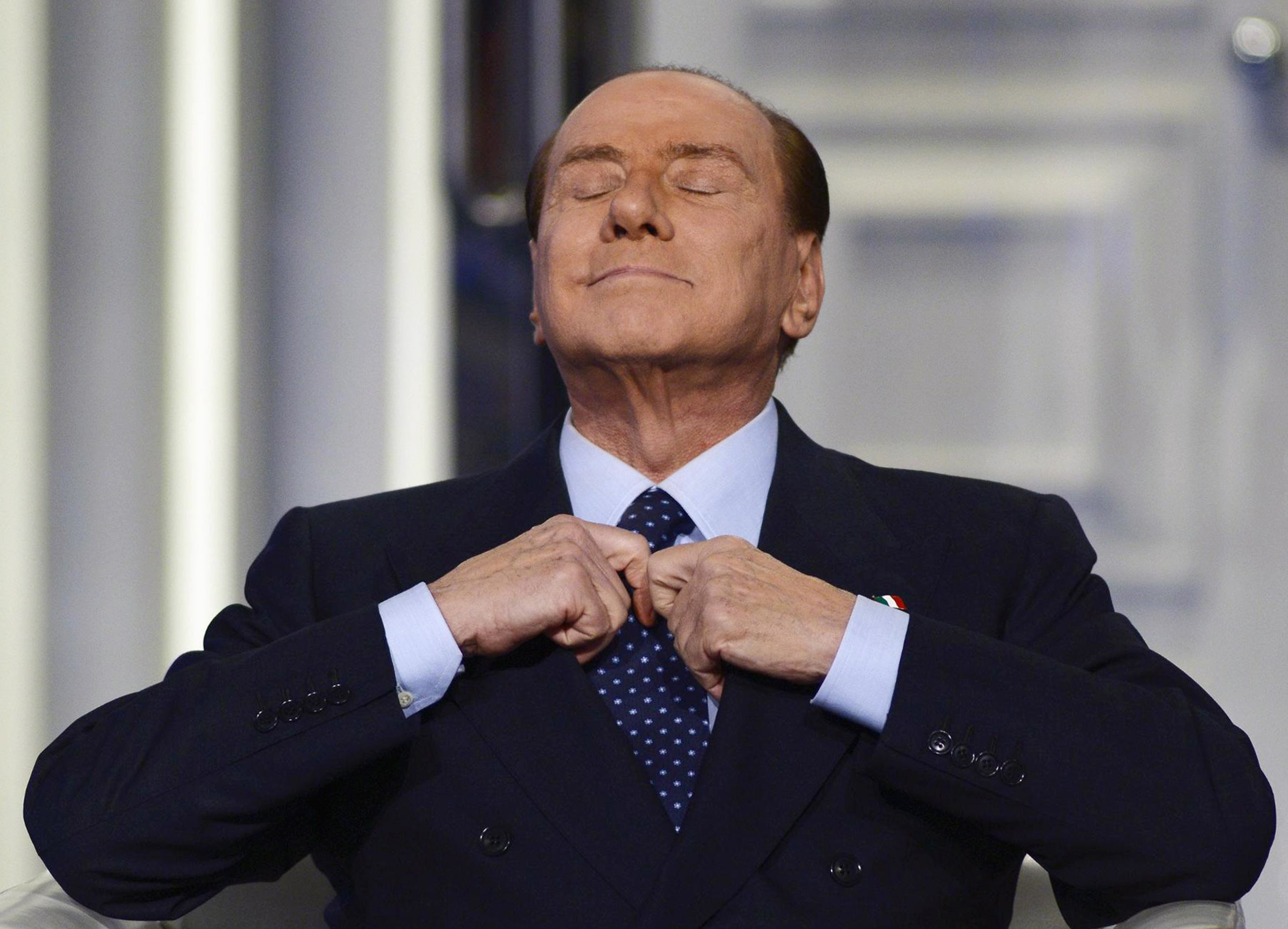 Rome (Italy), 18/12/2012.- (FILE) Former Italian Prime Minister Silvio Berlusconi adjusting his tie during the recording of the Italian Rai 1 television program 'Porta a porta', in Rome, Italy, 18 December 2012 (reissued 12 June 2023). Silvio Berlusconi has died at the age of 86 on 12 June 2023 at San Raffaele hospital in Milan, where he was hospitalized again since last 09 June, sources close to his family told ANSA. The Italian media tycoon and Forza Italia (FI) party founder served as prime minister of Italy in four governments. (Italia, Roma) EFE/EPA/GUIDO MONTANI *** Local Caption *** 51003898