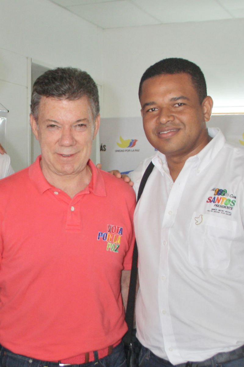 Yahir Acuña y Juan Manuel Santos