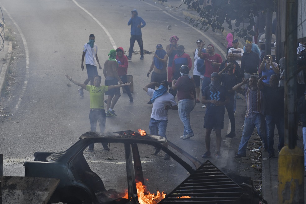 Manifestantes opositores al Gobierno de Nicolás Maduro, Caracas, Venezuela. / AFP