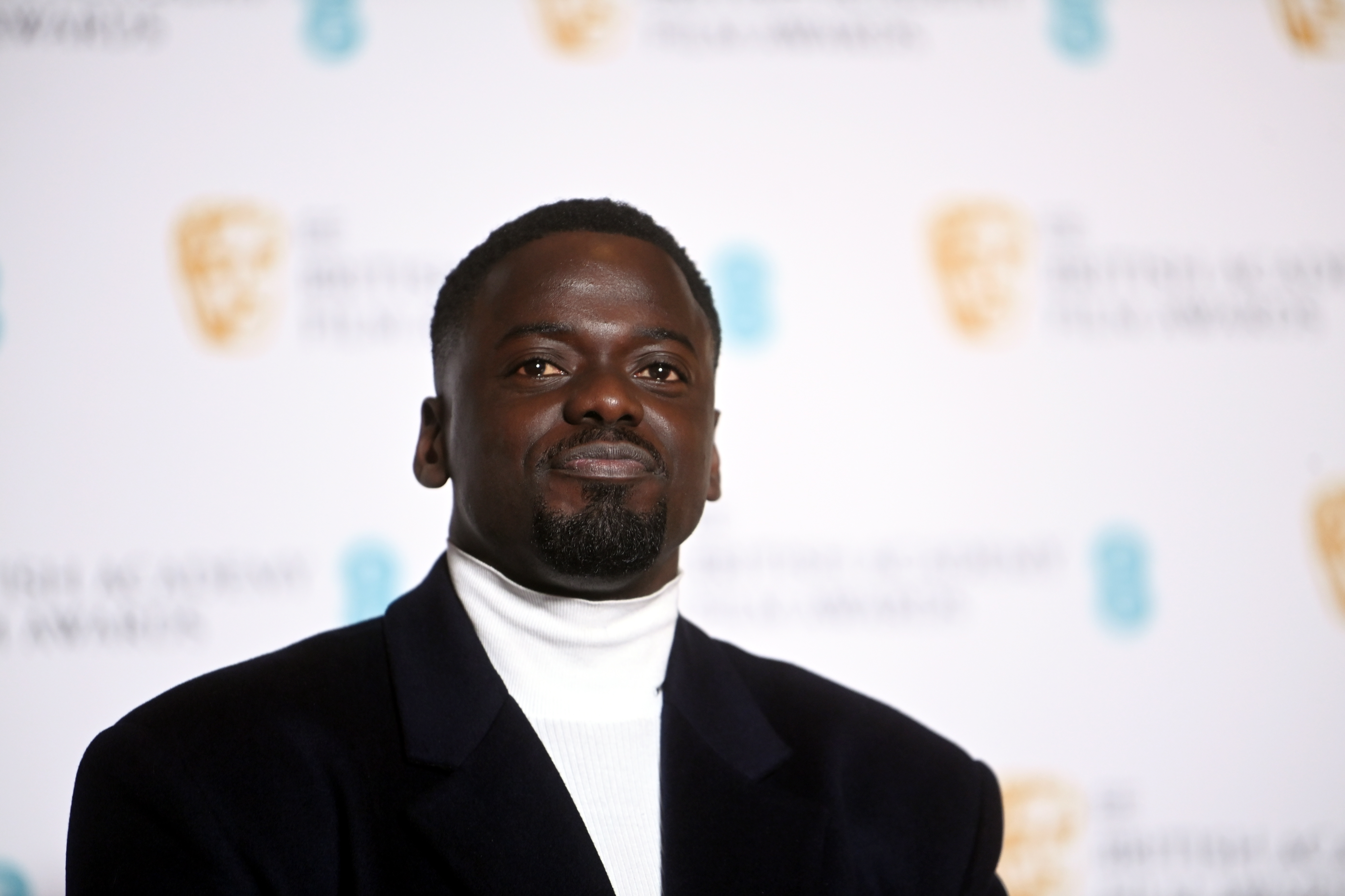 London (United Kingdom), 13/03/2022.- Daniel Kaluuya poses in the press room during the 75th BAFTA Film Awards at the Royal Albert Hall in London, Britain, 13 February 2022. The ceremony is hosted by the British Academy of Film and Television Arts (BAFTA). (Reino Unido, Londres) EFE/EPA/NEIL HALL *** Local Caption *** 55844832