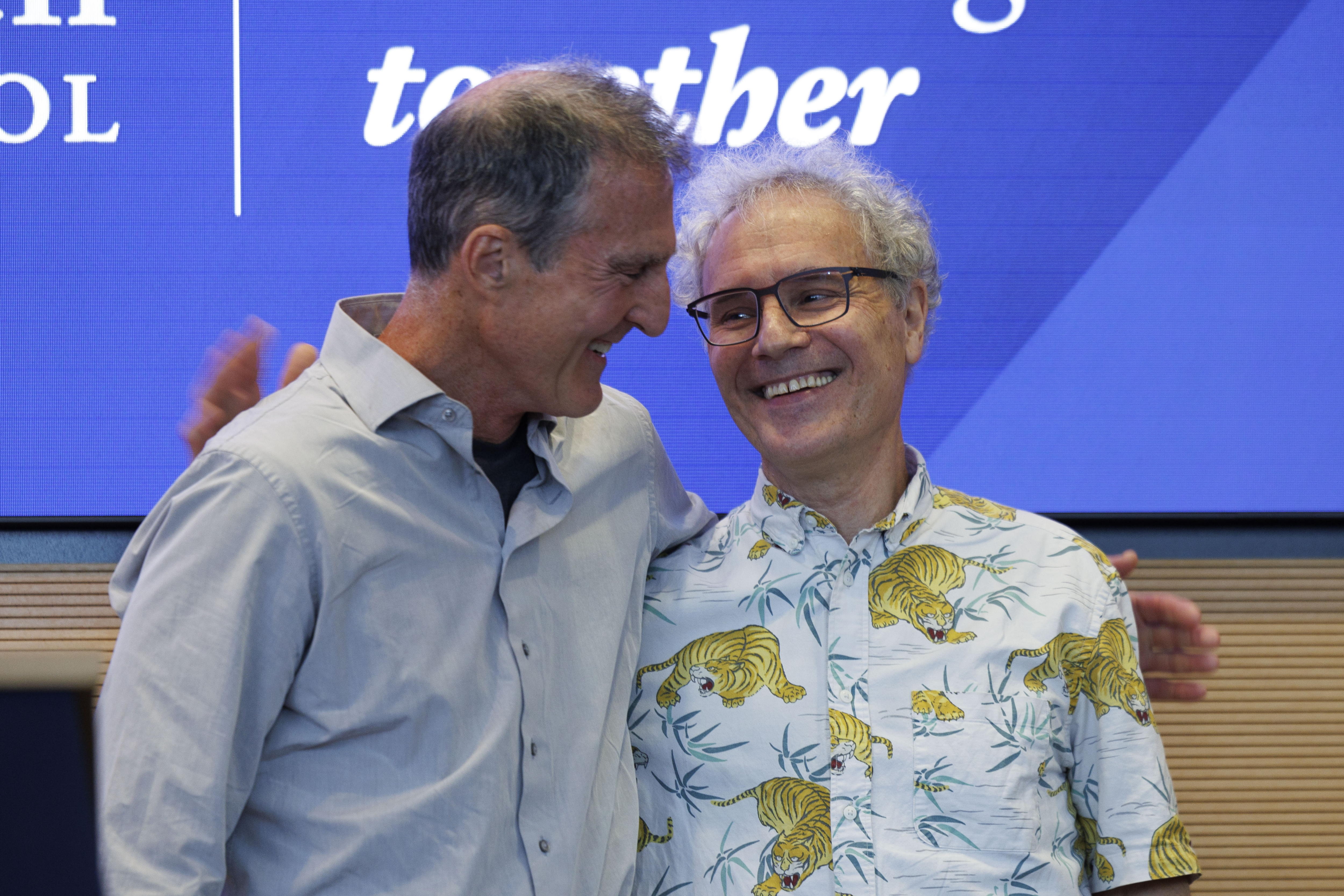 Worcester (United States), 07/10/2024.- Victor Robert Ambros, co-winner of the Nobel Prize awarded in Physiology or Medicine for his work on the discovery of MicroRNA, is embraced by former Nobel Prize recipient Craig Mello (L) following a press conference at the UMass Chan Medical School in Worcester, Massachusetts, USA, 07 October 2024. Gary Bruce Ruvkun also was awarded the Nobel Prize with Ambrose. EFE/EPA/CJ GUNTHER