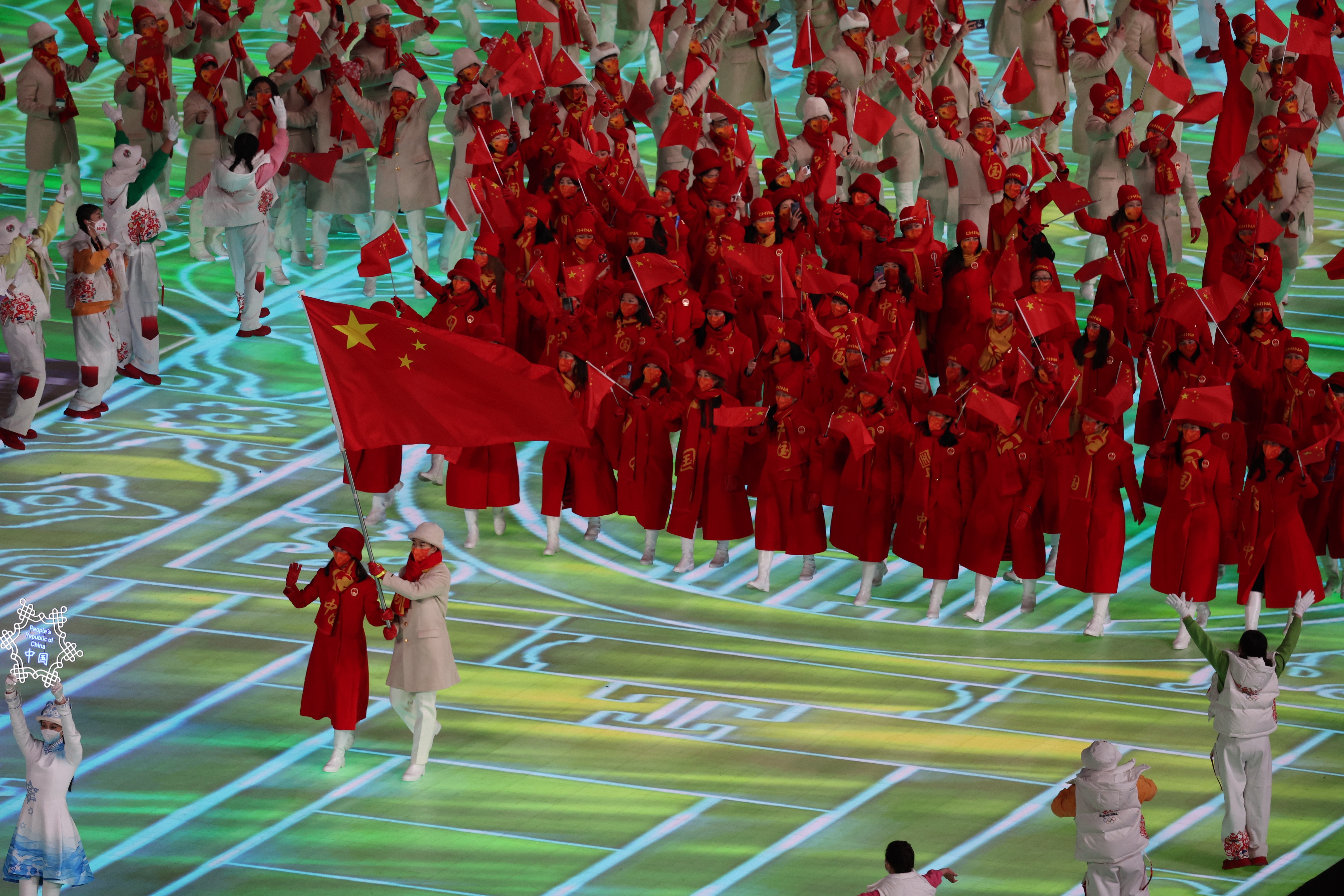 Beijing (China), 04/02/2022.- Athletes of China arrive for the Opening Ceremony for the Beijing 2022 Olympic Games at the National Stadium, also known as Bird's Nest, in Beijing China, 04 February 2022. EFE/EPA/FAZRY ISMAIL