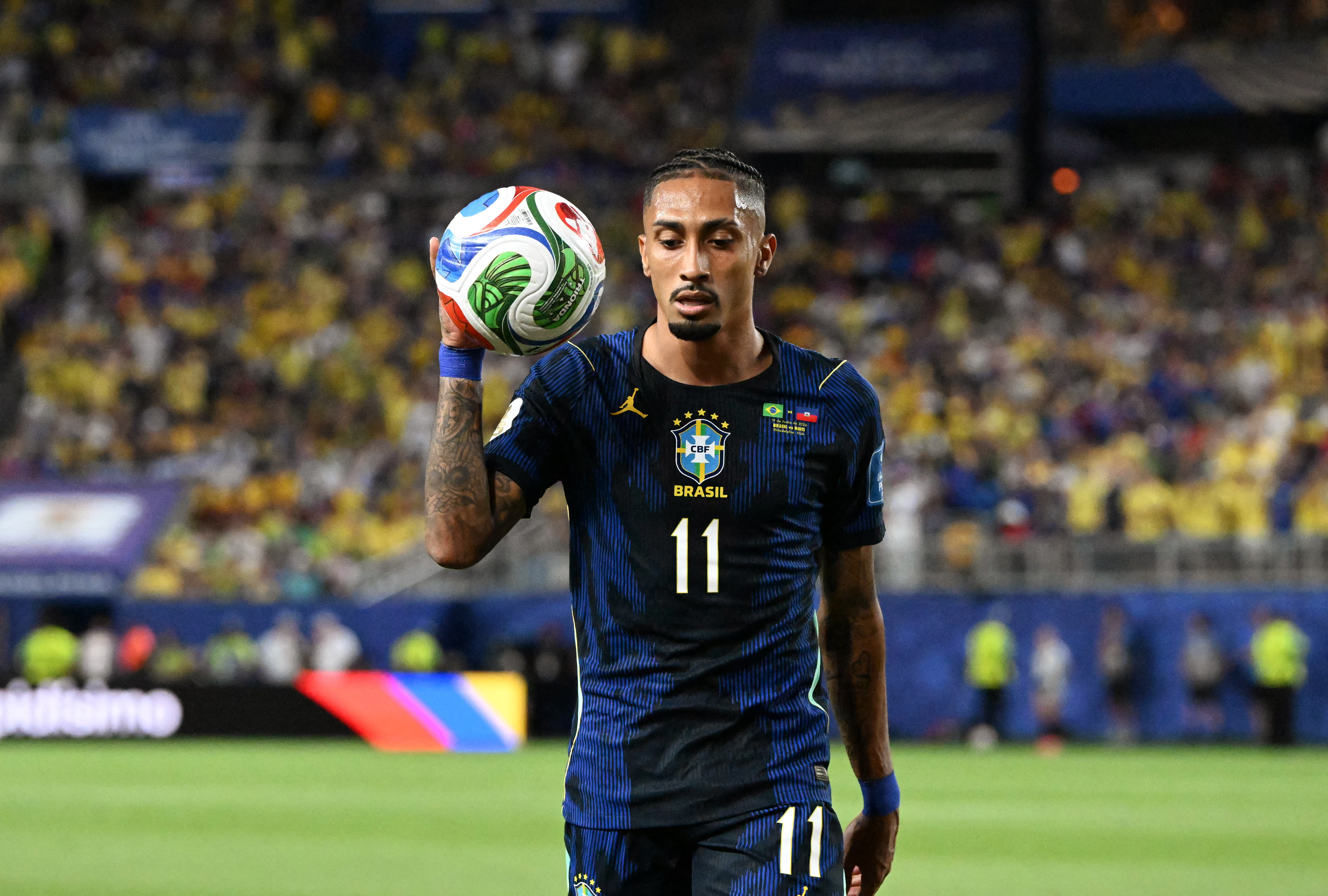 Brazil's forward #11 Raphinha holds the ball during the 2026 World Cup Group C football match between Brazil and Haiti at the Philadelphia Stadium in Philadelphia on June 19, 2026. (Photo by ROBERTO SCHMIDT / AFP)