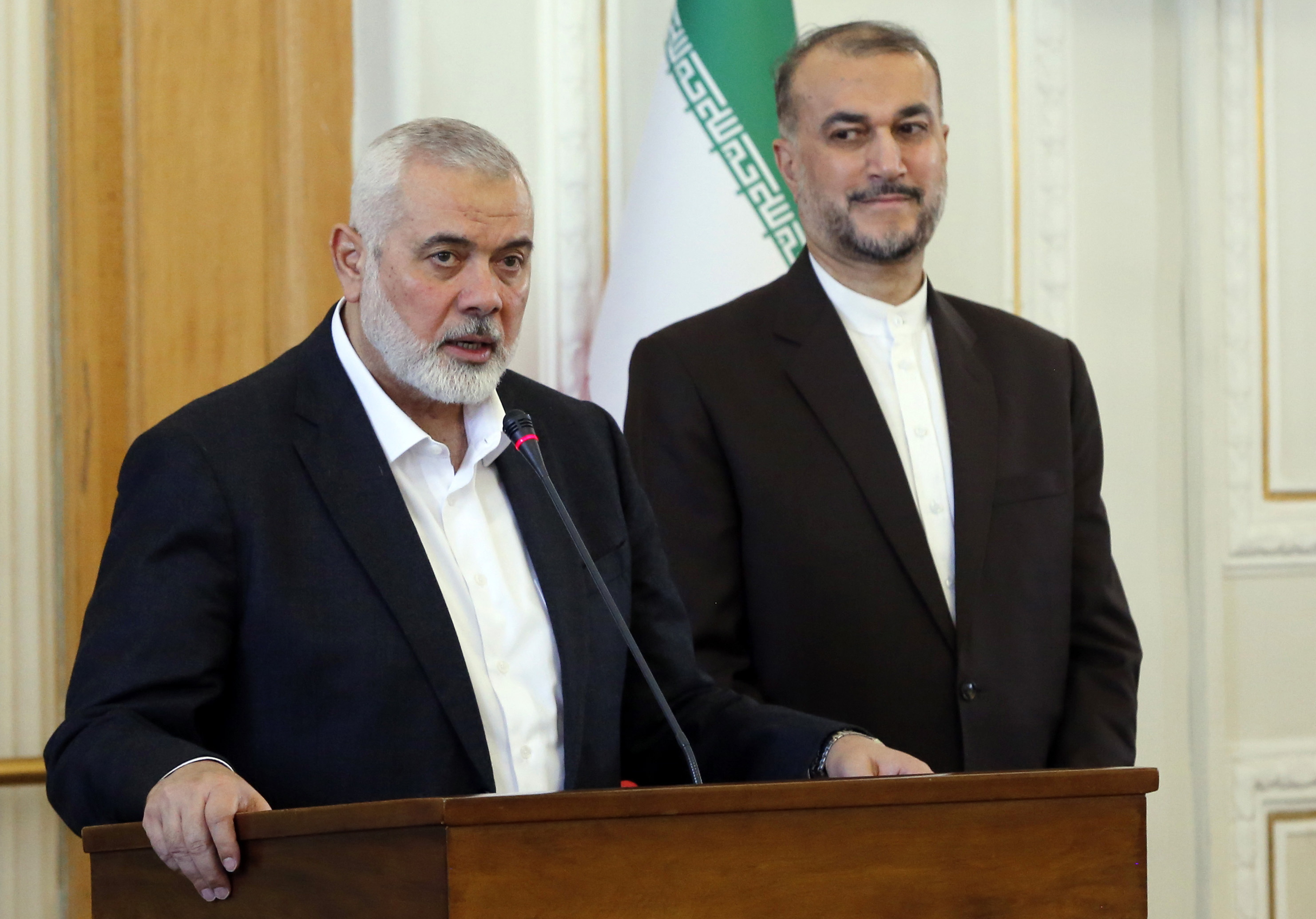 Tehran (Iran(islamic Republic Of)), 26/03/2024.- Hamas leader Ismail Haniyeh (L) speaks to the media as Iranian Foreign Minister Hossein Amir Abdoulhian (R) looks on, in Tehran, Iran, 26 March 2024. Haniyeh is in Tehran to meet with Iranian officials. (Teherán) EFE/EPA/ABEDIN TAHERKENAREH
