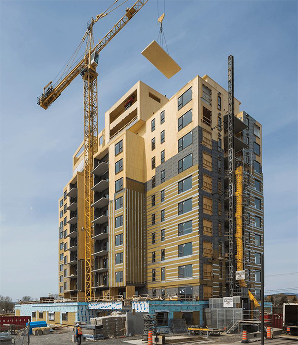 Como los muebles de Ikea, los edificios de madera en masa se montan con piezas prefabricadas. Se calcula que el condominio Origine de Quebec se construyó un 25 % más rápido que un edificio convencional.