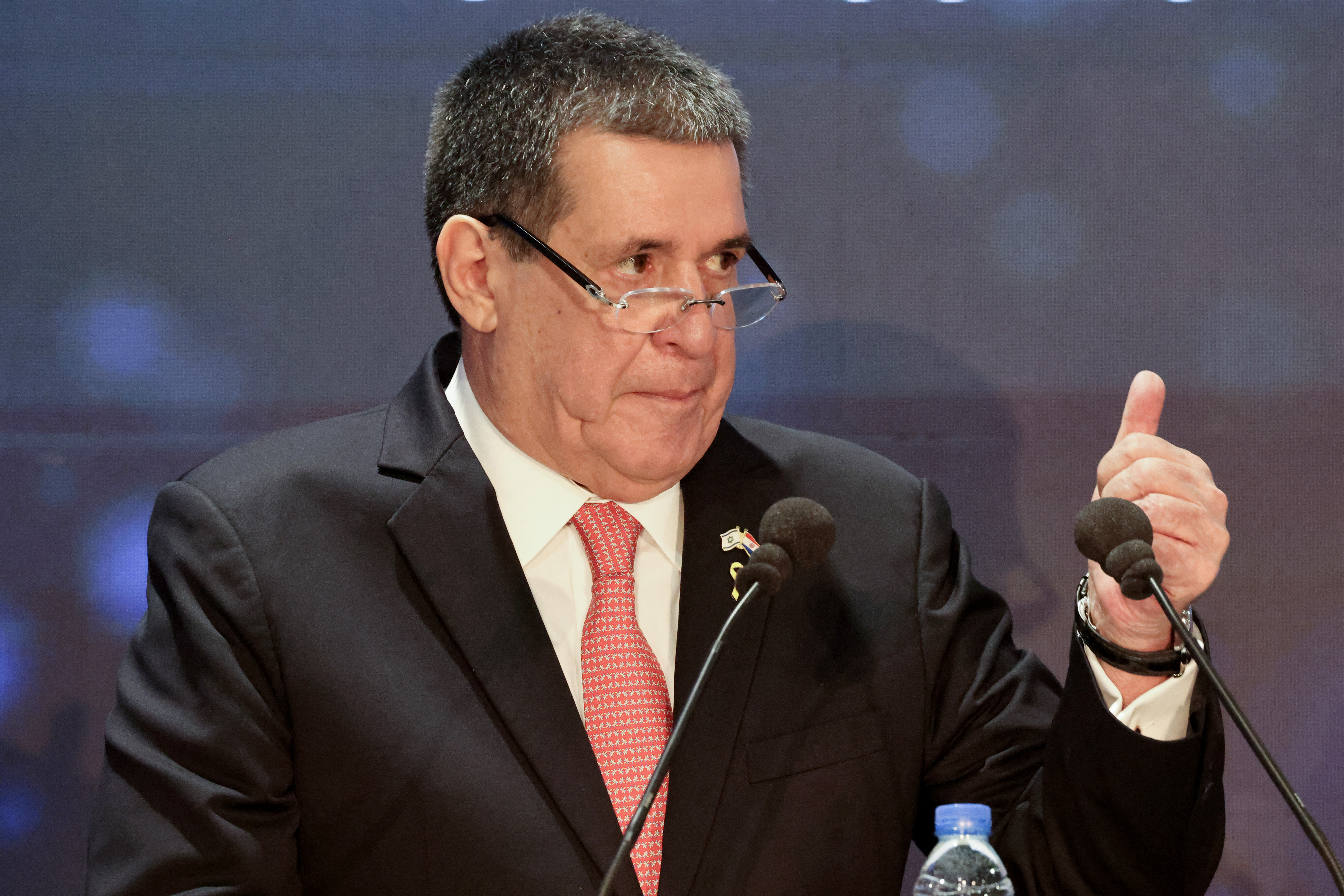 (FILES) Paraguayan politician and former president Horacio Manuel Cartes Jara speaks during a conference on antisemitism in Jerusalem on March 27, 2025.