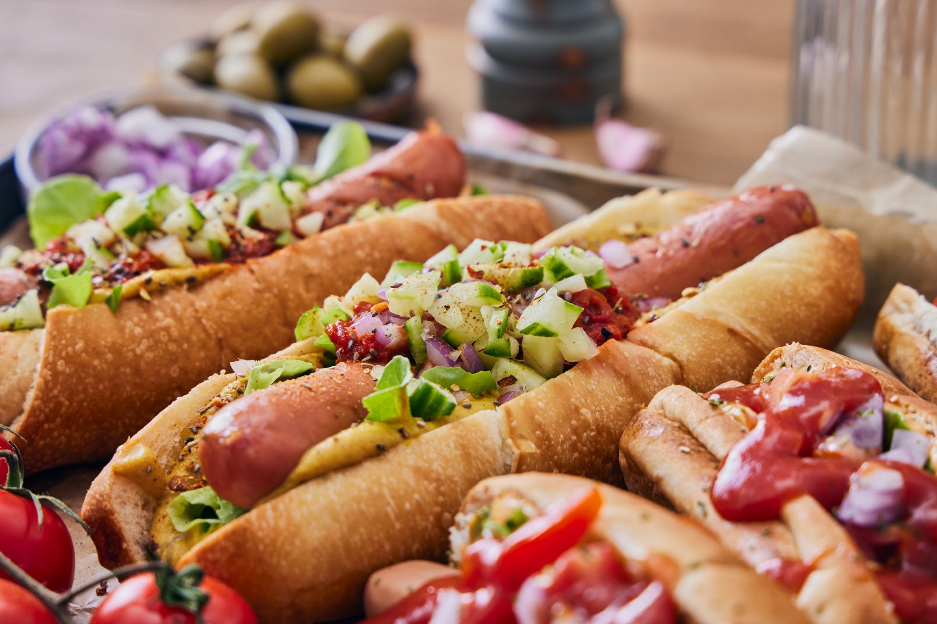 Receta: perros calientes con sabor criollo y mayonesa de cilantro y miel