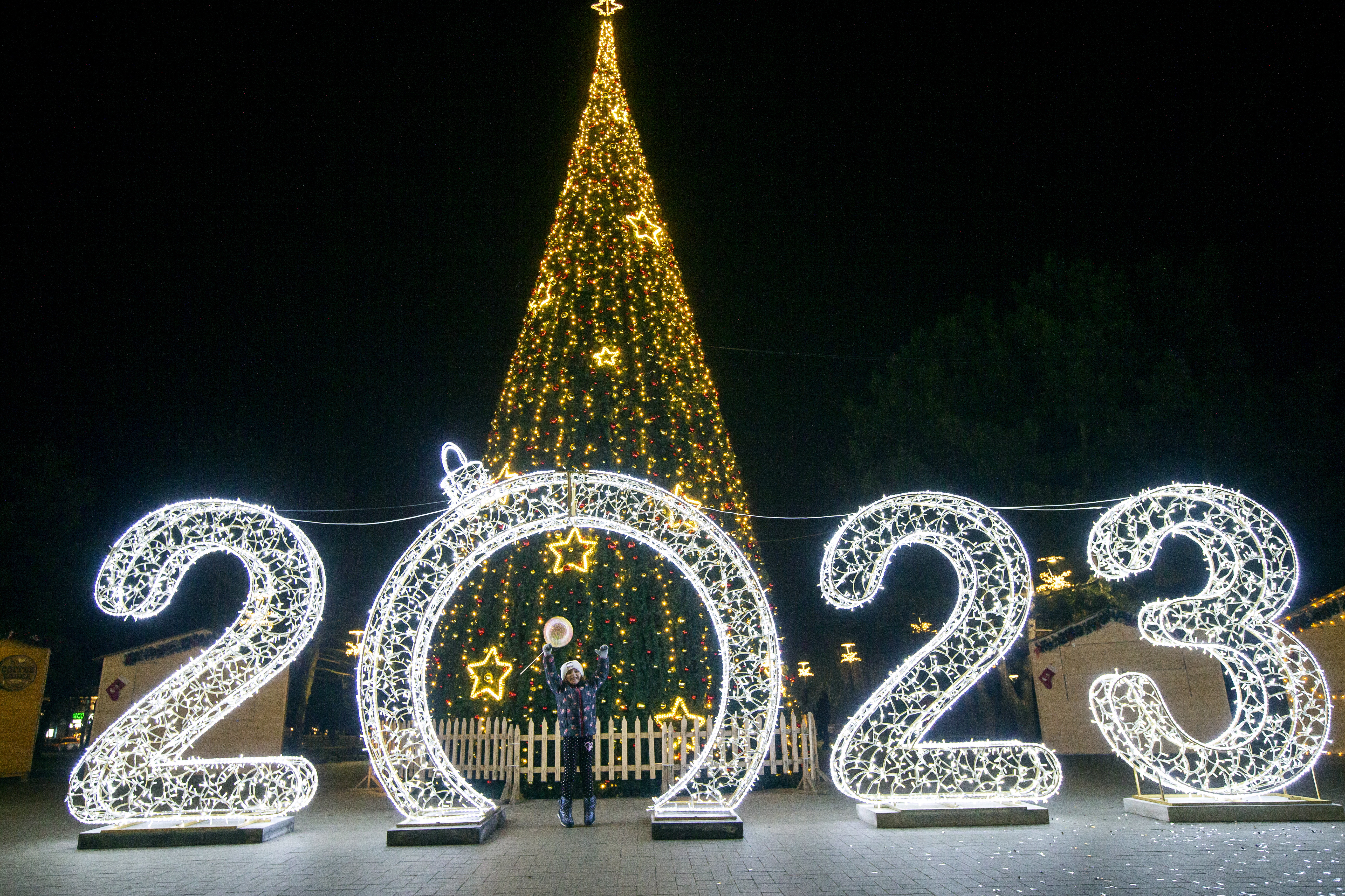 Chisinau (Moldova, Republic Of), 23/12/2022.- A girl poses with Christmas and New Years decorations, in Chisinau, Moldova, 23 December 2022. Traditionally, people from former countries of the Soviet Union celebrate Christmas on two occasions, on 25 December and on 07 January. (Moldavia) EFE/EPA/DUMITRU DORU