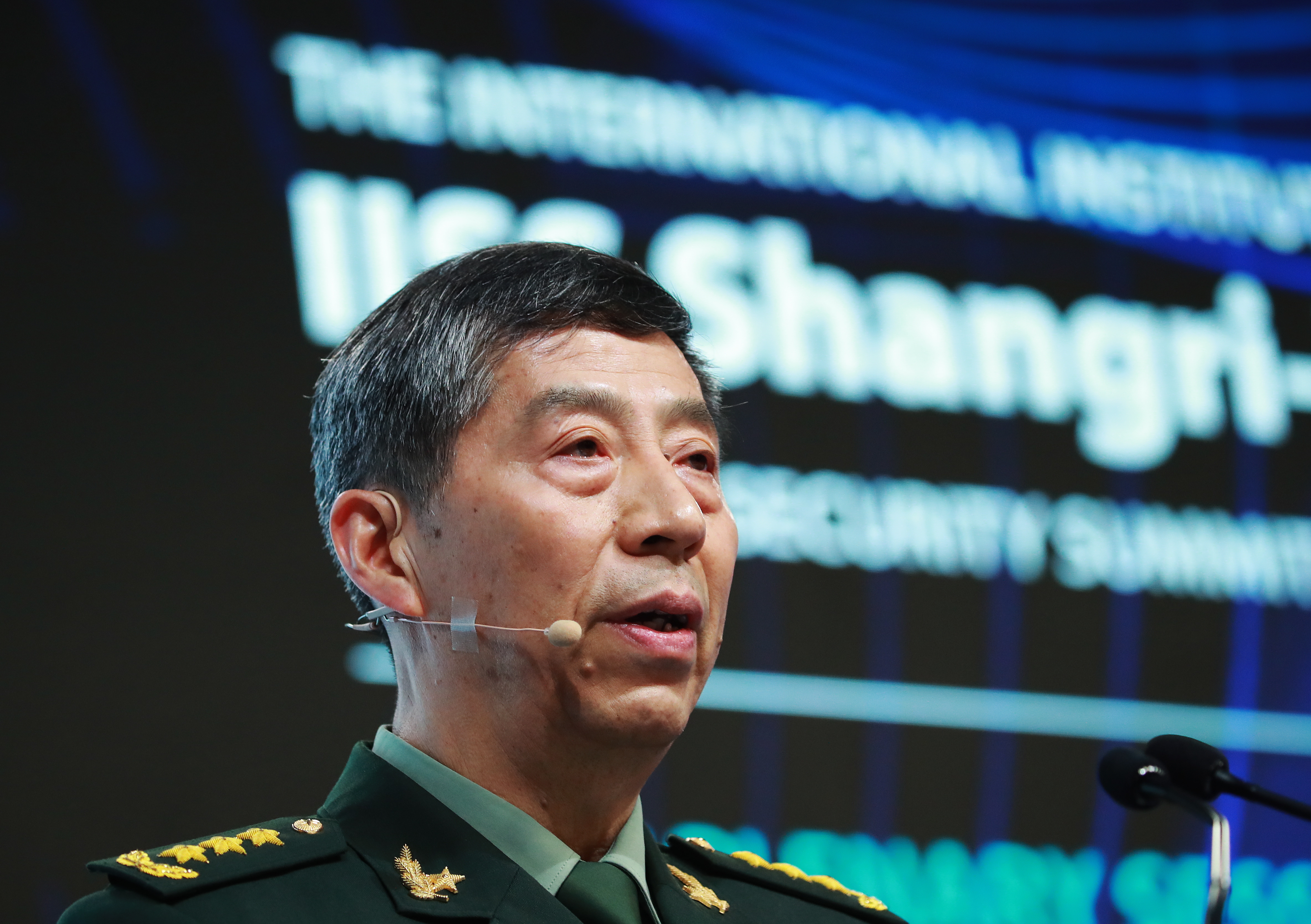 Singapore (Singapore), 03/06/2023.- Chinese State Councilor and Minister of National Defence General Li Shangfu delivers his speech during a plenary session of the International Institute for Strategic Studies (IISS) Shangri-la Dialogue at the Shangri-la hotel in Singapore, 04 June 2023. Defense ministers and officials from 41 countries are gathered in the city state for the IISS Shangri-la Dialogue, an annual high level defence summit in the Asia Pacific region. (Singapur, Singapur) EFE/EPA/HOW HWEE YOUNG