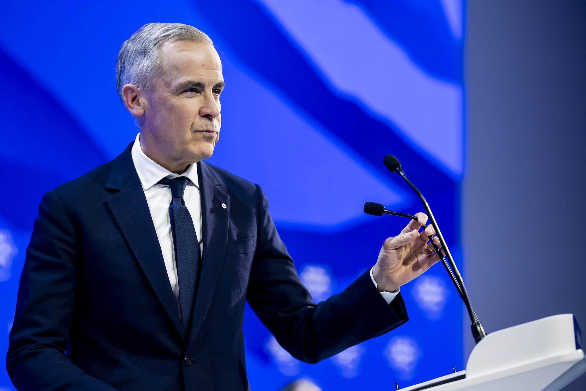 DAVOS (Switzerland), 20/01/2026.- Canada Prime Minister Mark Carney speaks during a plenary session in the Congress Hall at the 56th annual meeting of the World Economic Forum (WEF) in Davos, Switzerland, 20 January 2026. The 2026 summit, running from 19 to 23 January and held under the theme 'A Spirit of Dialogue,' brings together global political leaders, corporate executives, and scientists to address international challenges. (Suiza) EFE/EPA/GIAN EHRENZELLER
