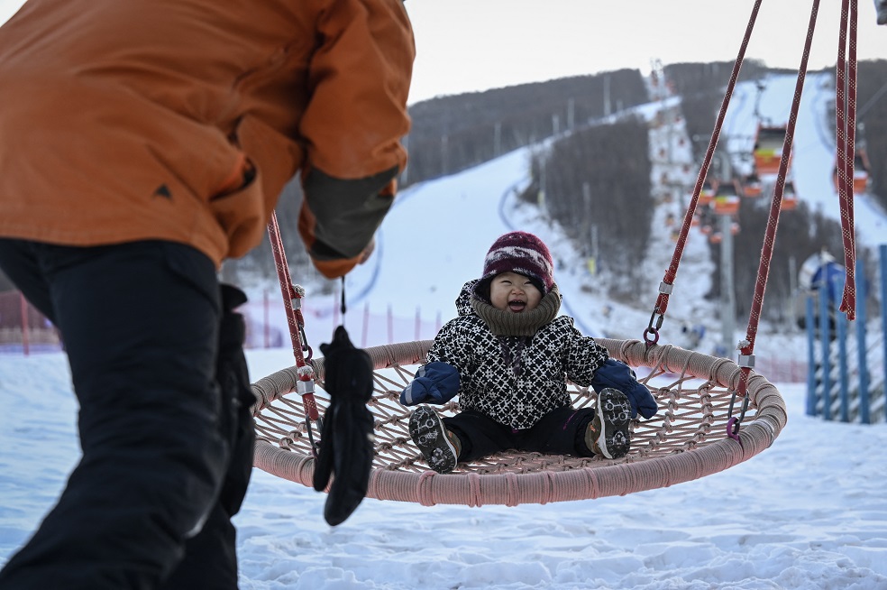 Bebé snowboarding