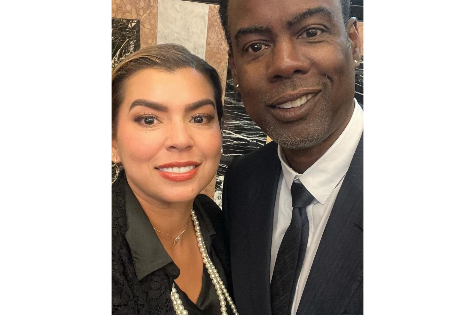 Pereira junto al actor y comediante Chris Rock.