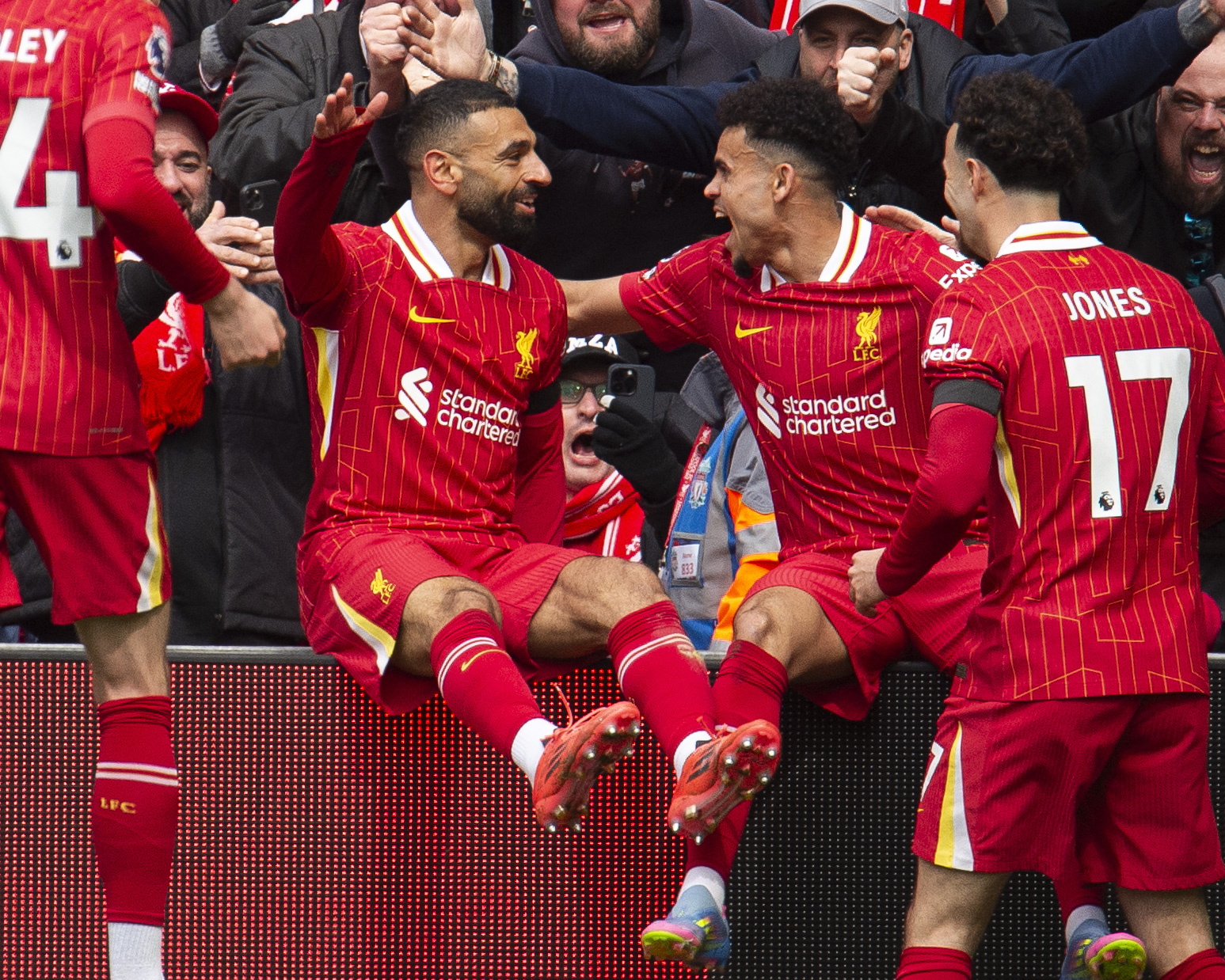 LIVERPOOL (United Kingdom), 13/04/2025.- Luis Diaz of Liverpool celebrates after scoring the opening goal with Mohamed Salah of Liverpool during the English Premier League soccer match between Liverpool FC and West Ham United, in Liverpool, Britain, 13 April 2025. (Reino Unido) EFE/EPA/PETER POWELL EDITORIAL USE ONLY. No use with unauthorized audio, video, data, fixture lists, club/league logos, 'live' services or NFTs. Online in-match use limited to 120 images, no video emulation. No use in betting, games or single club/league/player publications.
