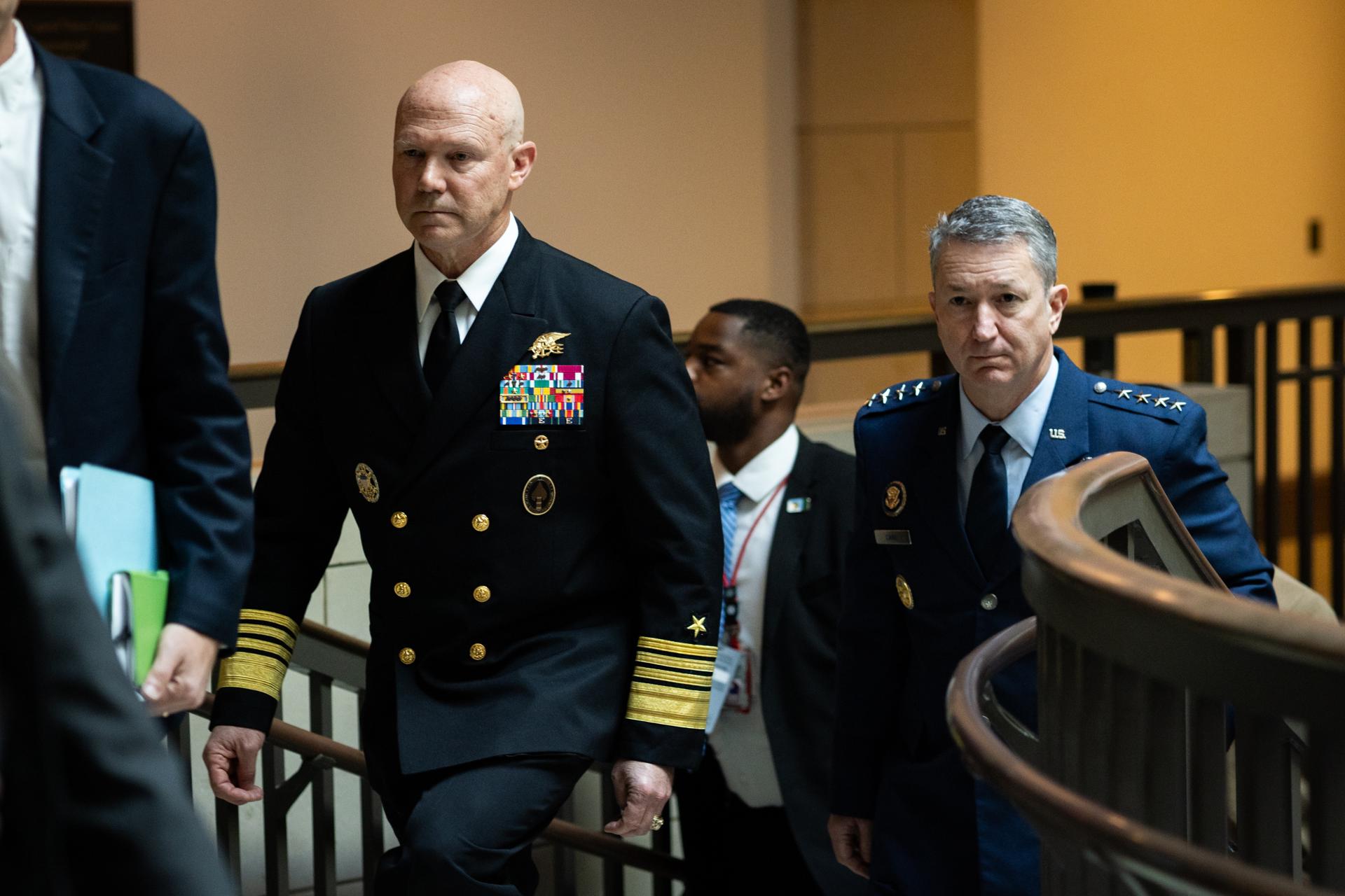 WASHINGTON (United States), 04/12/2025.- John D. Caine (R), chairman of the Joint Chiefs of Staff, and Navy Admiral Frank Bradley (C) arrive for a briefing with lawmakers at the US Capitol in Washington, DC, USA, 04 December 2025. EFE/EPA/MAANSI SRIVASTAVA