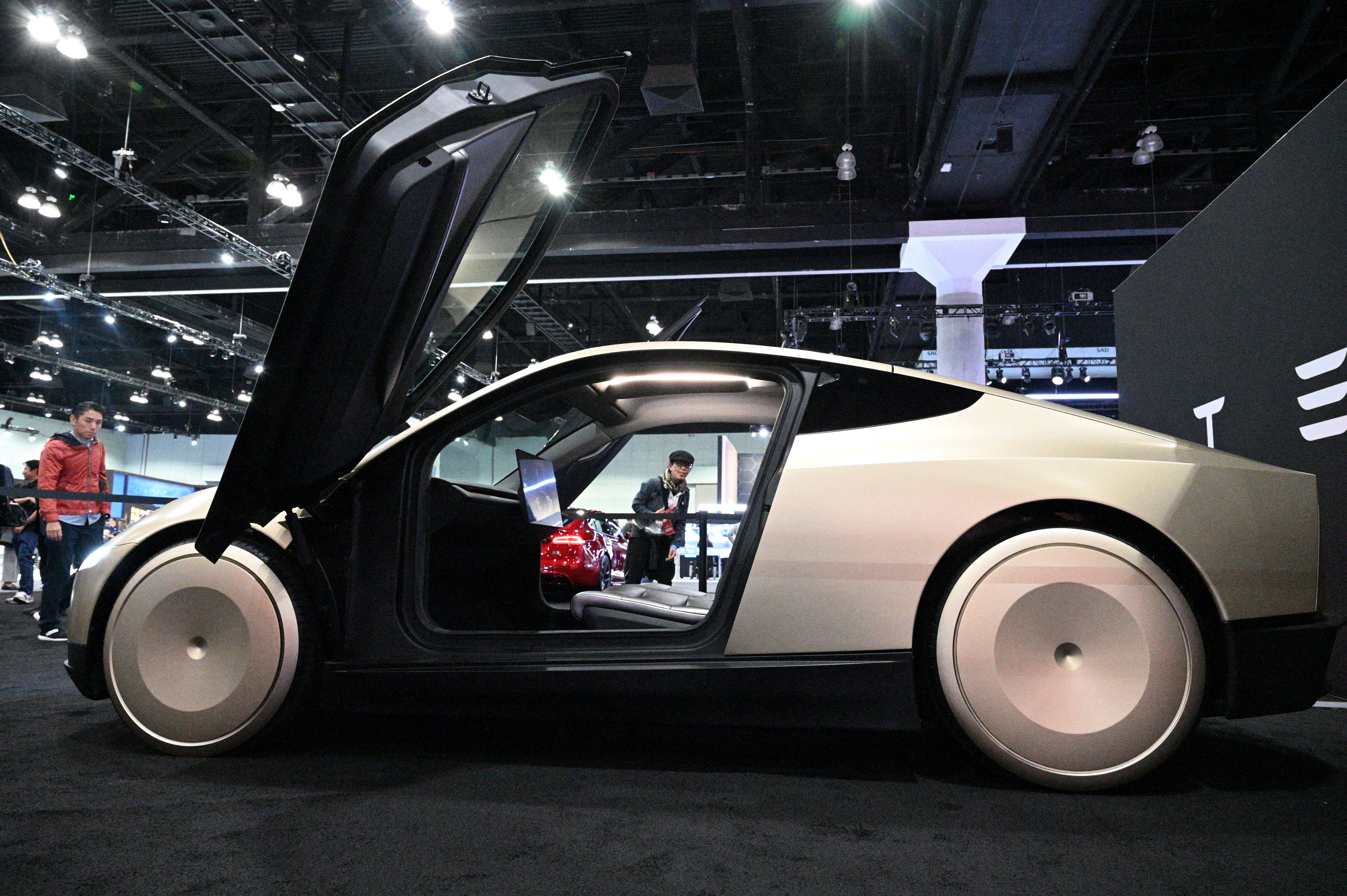 (FILES) Tesla's Cybercab robotaxi is displayed during the AutoMobility LA 2024 auto show at the Los Angeles Convention Center in Los Angeles, November 21, 2024.