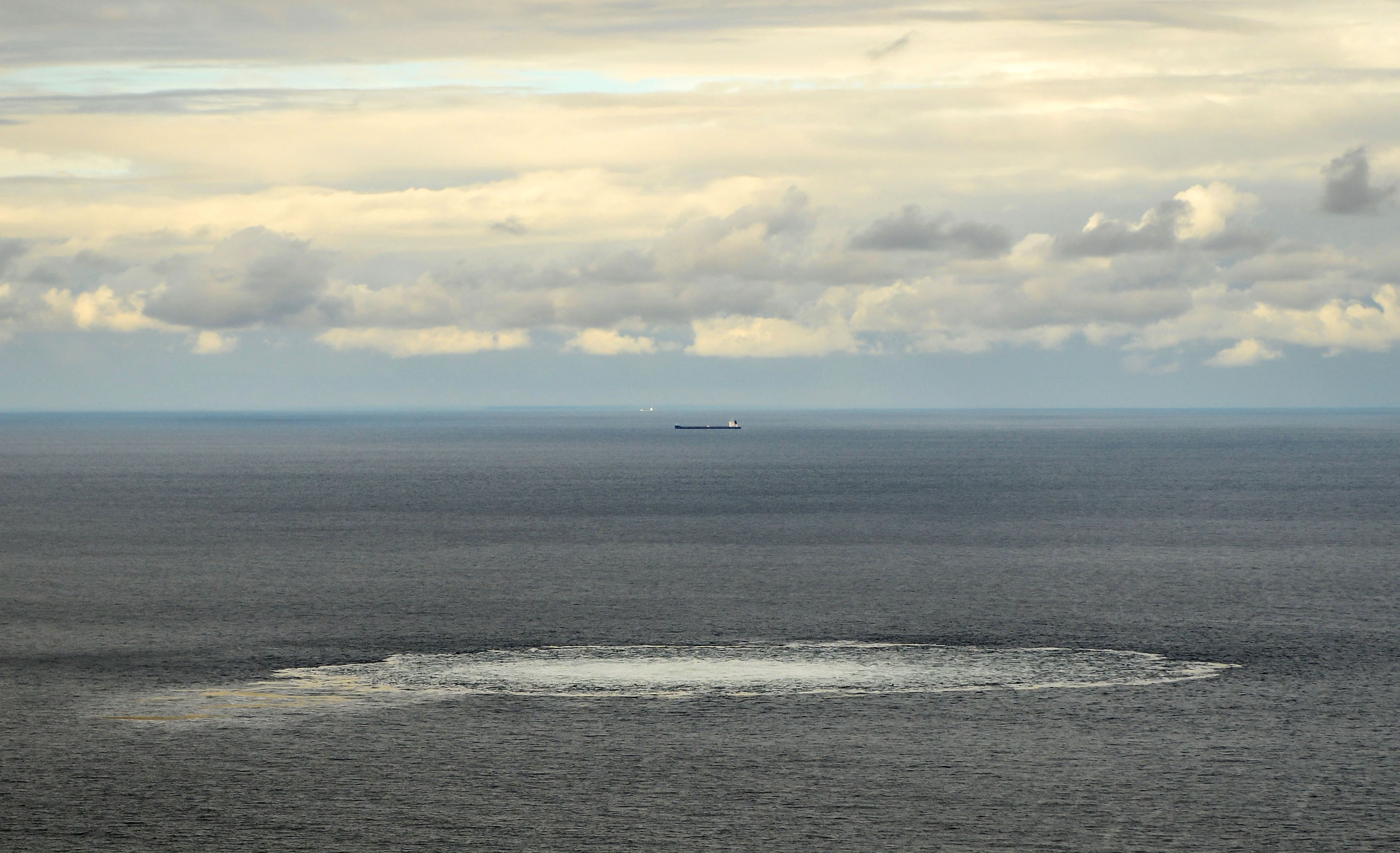 (FILES) This handout picture released on September 30, 2022 by the Danish Defence Command and taken on September 29, 2022 shows one of four gas leaks at one of the damaged Nord Stream gas pipelines in the Baltic Sea.
