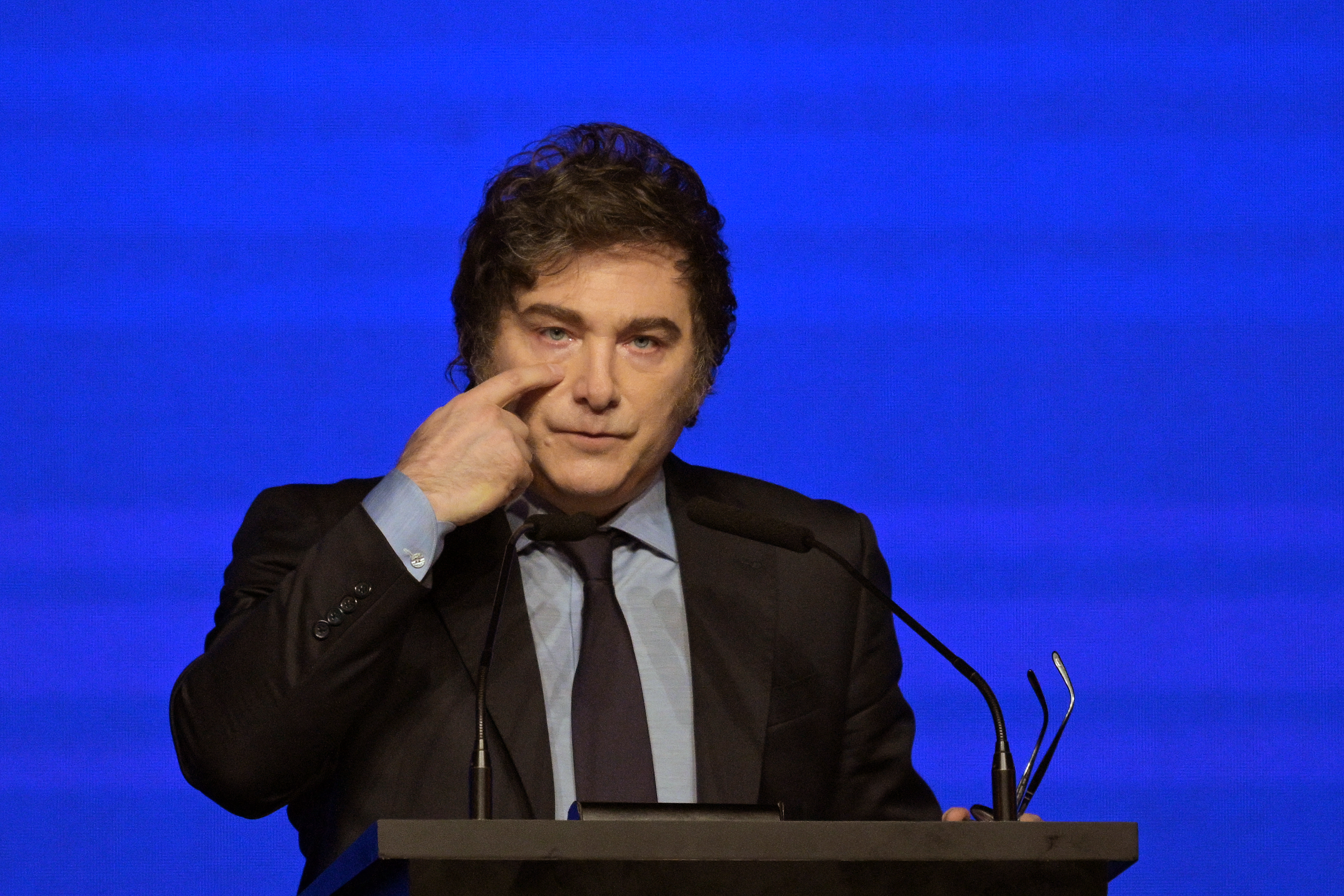 (FILES) Argentina's President Javier Milei gestures during the Conservative Political Action Conference (CPAC) in Buenos Aires on December 4, 2024.