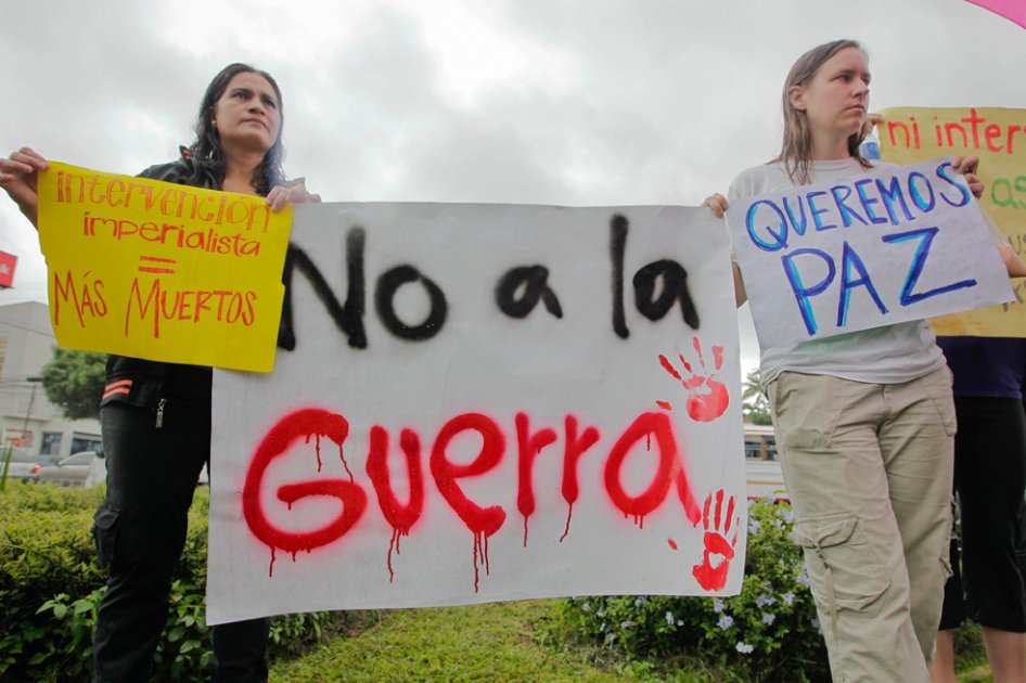 Manifestantes protestan contra la intervención armada en Siria. Foto: EFE