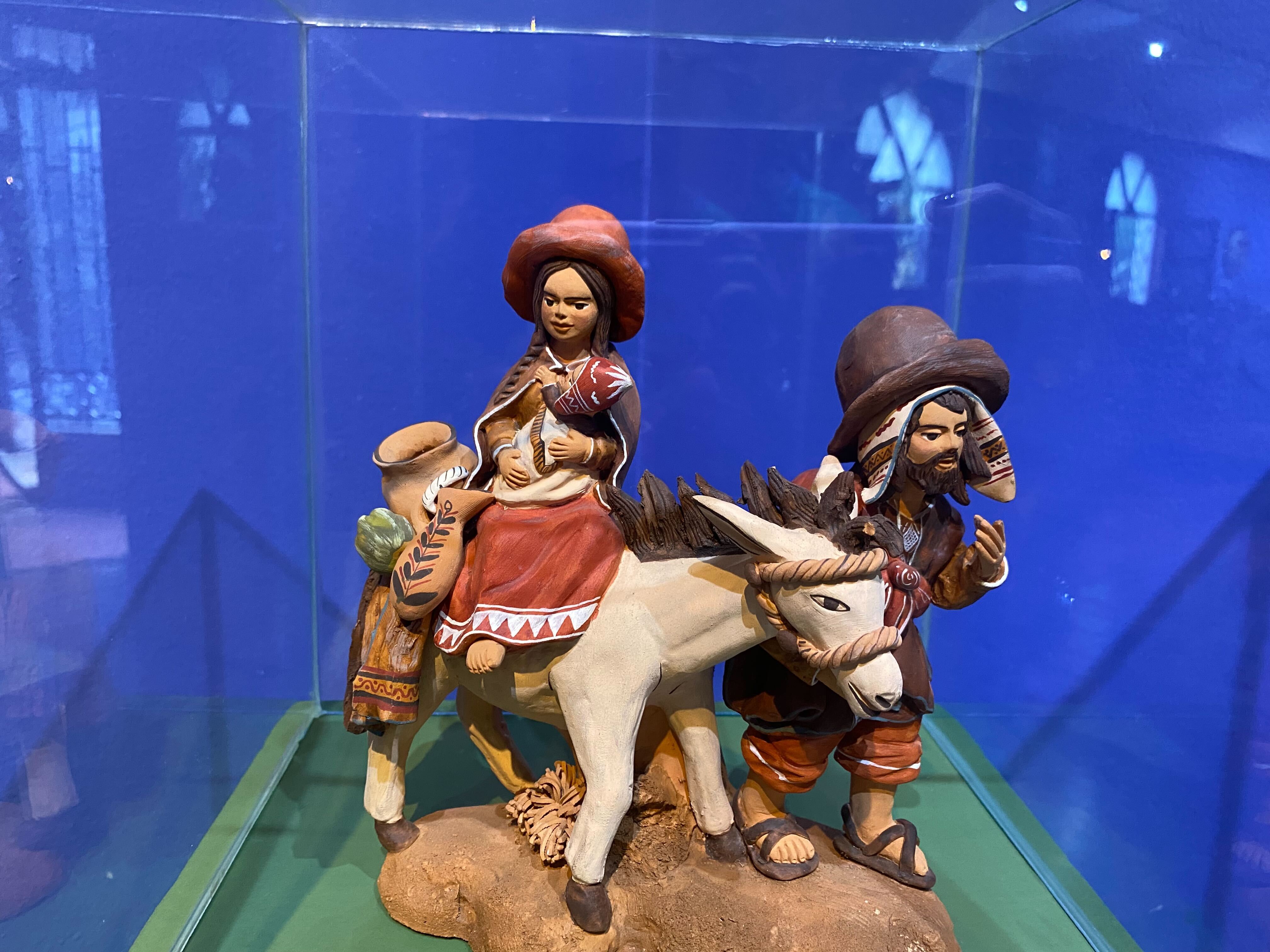 Este pesebre típico peruano se llama "Huída a Egipto".