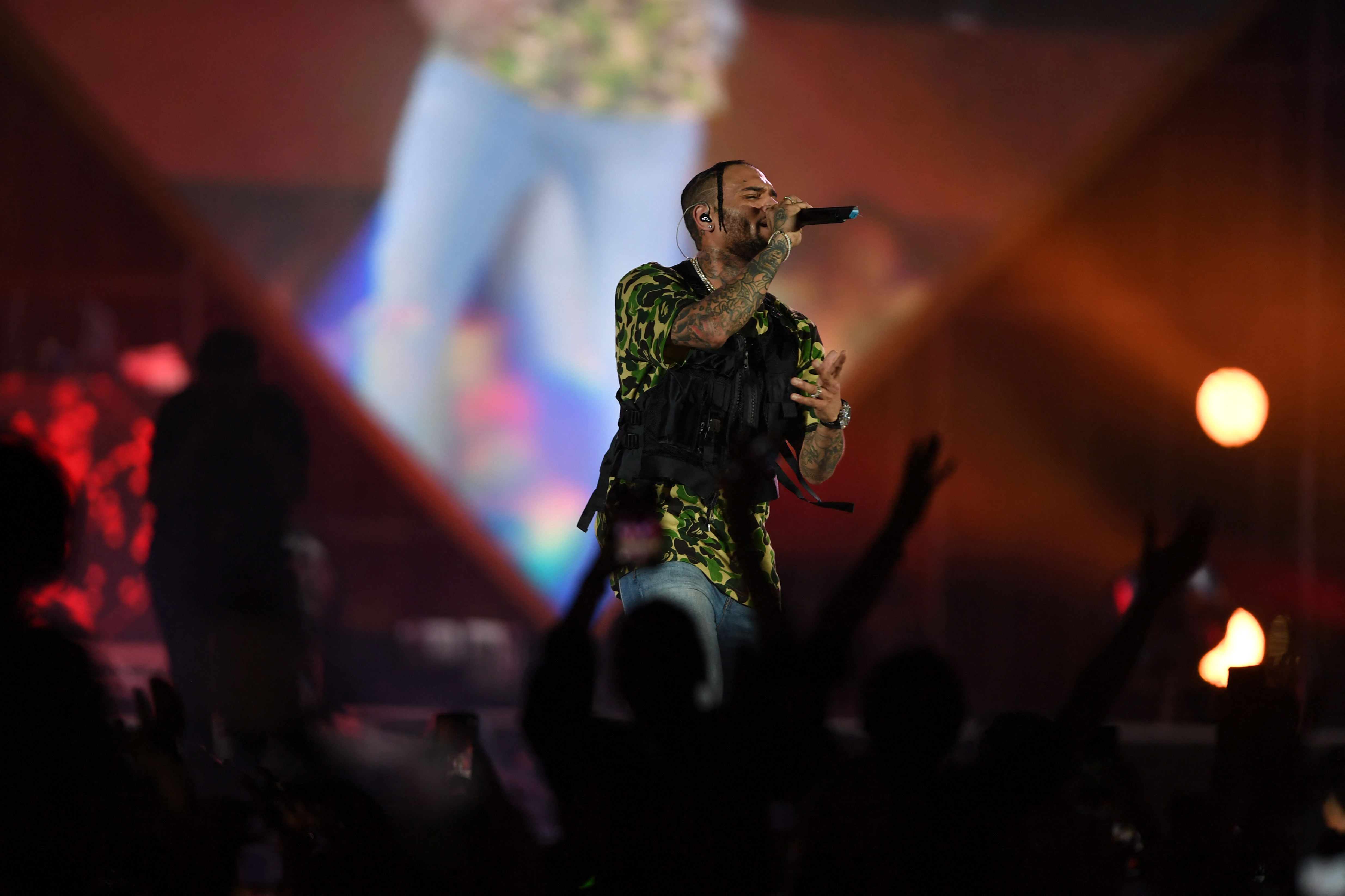 (FILES) US singer Chris Brown performs on stage during the Jeddah World music Festival on July 18, 2019, at the King Abdullah Sports City in the coastal city of Jeddah.