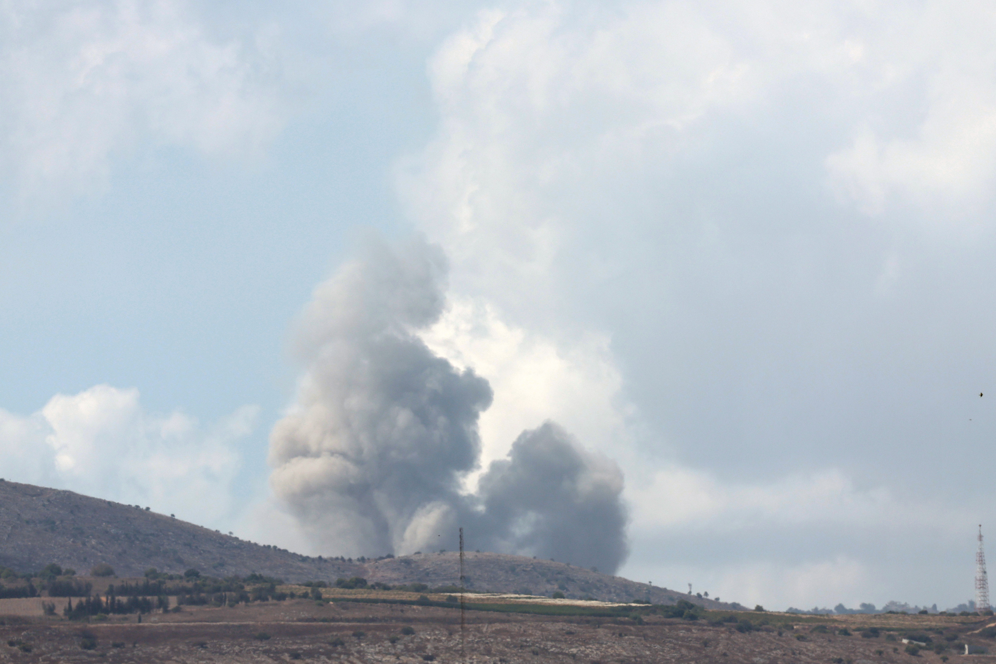 Upper Galilee (Israel), 23/09/2024.- Smoke rises after an Israeli airstrike targeting an area near a village in southern Lebanon, as seen from the Upper Galilee, northern Israel, 23 September 2024. The Israeli military announced on 23 September that it launched 'extensive' airstrikes on Hezbollah targets in Lebanon. Lebanese residents of villages in the Beqaa Valley 'who are inside or near houses where rockets and weapons are stored' have been warned to 'move away immediately! For your safety and protection', the statement added. According to Lebanon's Ministry of Health, at least 182 people have been killed and more than 720 others injured following continued Israeli airstrikes on southern Lebanese towns and villages since 23 September morning. (Líbano, Hizbulá/Hezbolá) EFE/EPA/ATEF SAFADI