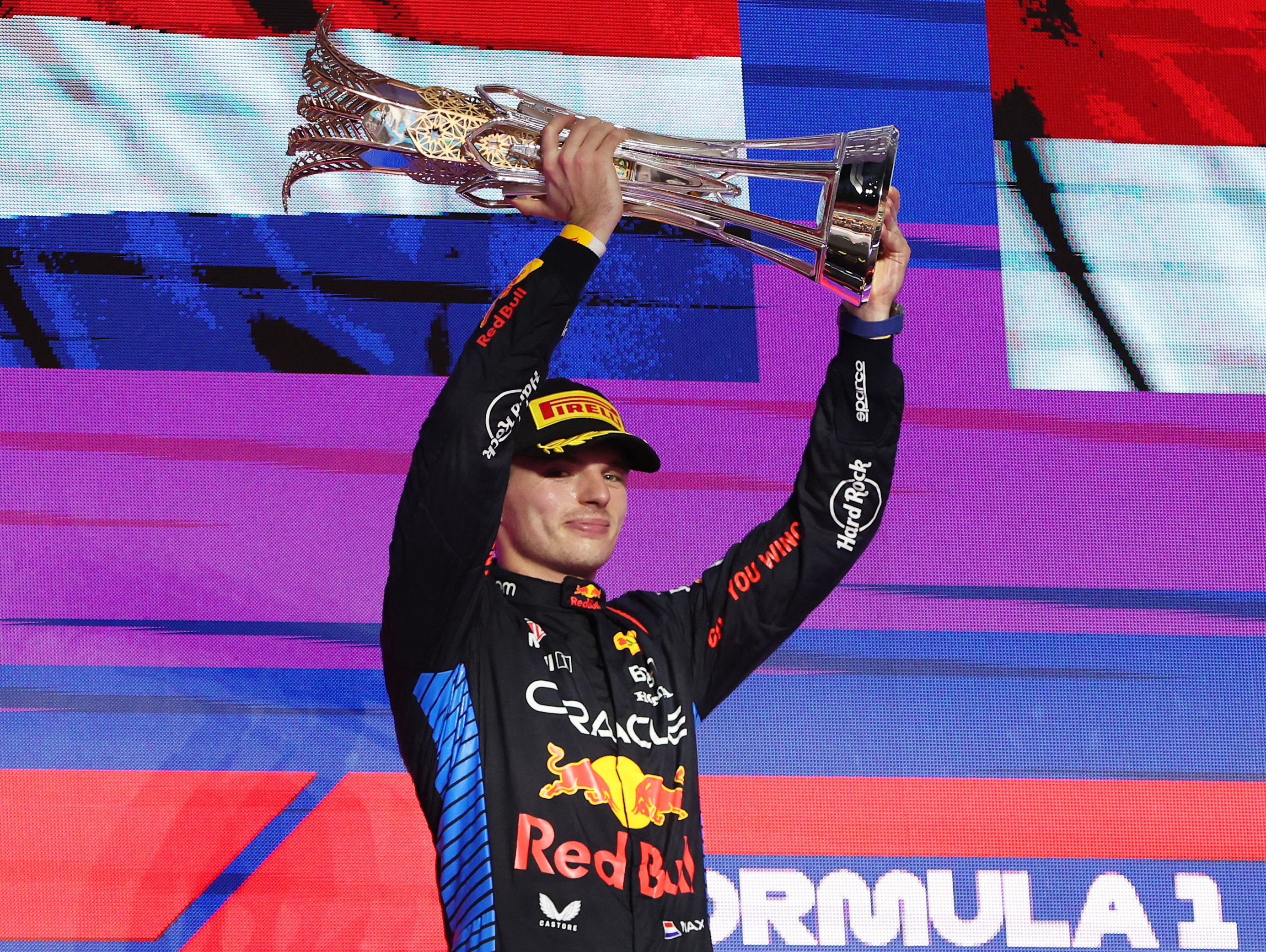 Jeddah (Saudi Arabia), 09/03/2024.- Winning Red Bull Racing driver Max Verstappen of Netherlands celebrates with the trophy on the podium after the Formula 1 Saudi Arabia Grand Prix at the Jeddah Corniche Circuit in Jeddah, Saudi Arabia, 09 March 2024. (Fórmula Uno, Países Bajos; Holanda, Arabia Saudita) EFE/EPA/ALI HAIDER