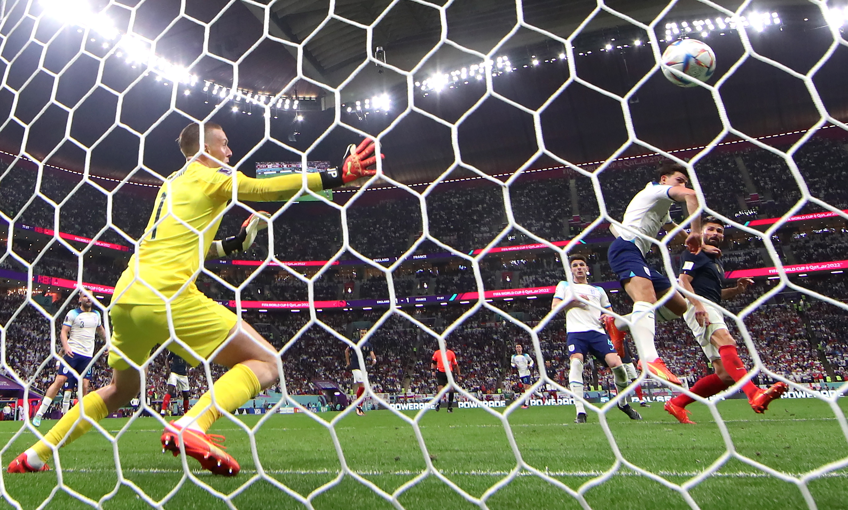 Al Khor (Qatar), 10/12/2022.- Olivier Giroud of France (R) scores the second goal of his team during the FIFA World Cup 2022 quarter final soccer match between England and France at Al Bayt Stadium in Al Khor, Qatar, 10 December 2022. (Mundial de Fútbol, Francia, Catar) EFE/EPA/Tolga Bozoglu