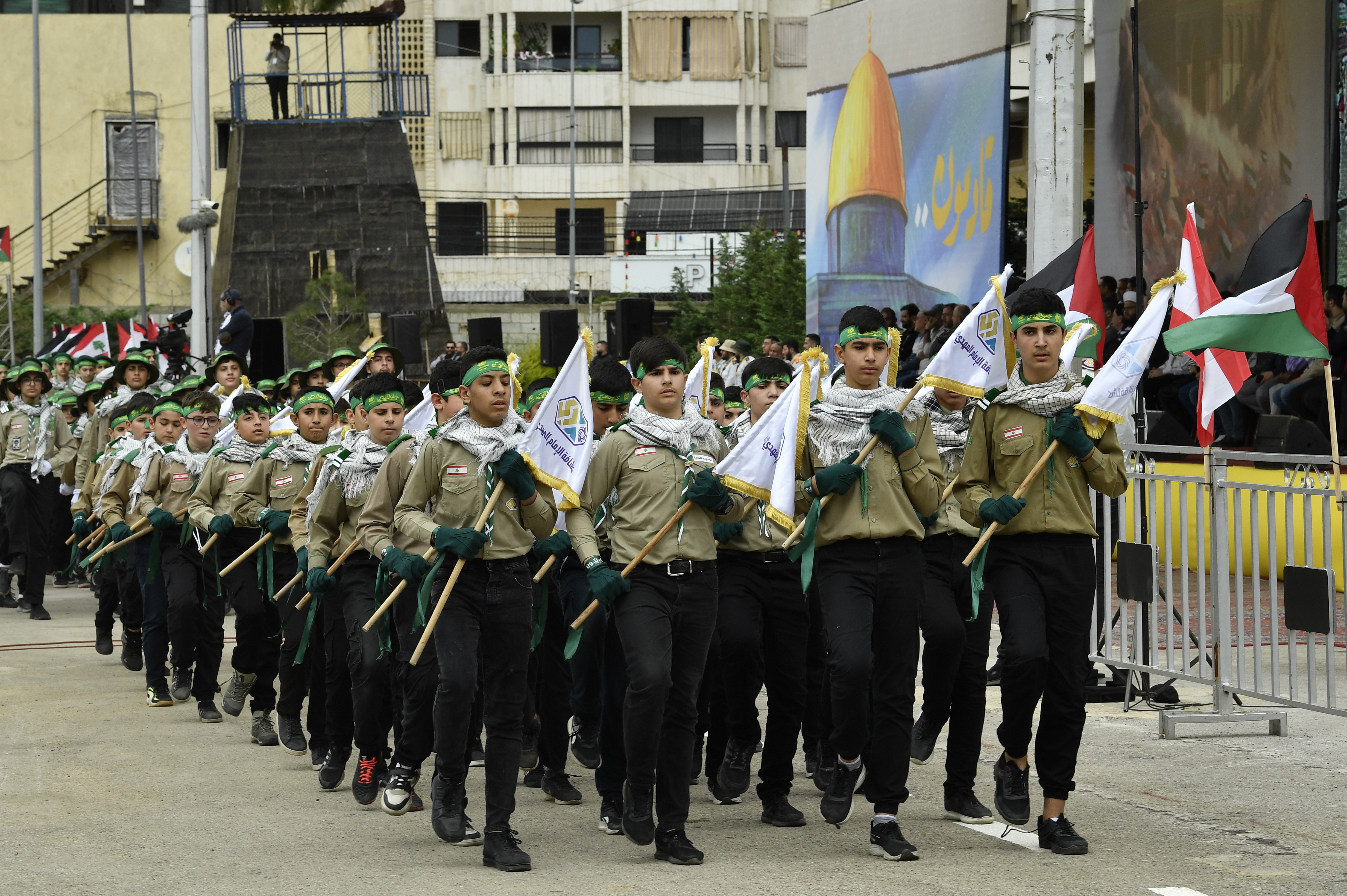 Beirut (Lebanon), 06/04/2024.- Hezbollah's Imam Al Mahdi Scouts march to commemorate Al Quds Day (Jerusalem Day) in a suburb of Beirut, Lebanon, 06 April 2024. Al Quds Day was declared in 1979 by the late Ayatollah Khomeini, founder of the Islamic Iranian Republic, who called on the world's Muslims to show solidarity with Palestinians on the last Friday of the fasting month of Ramadan. (Líbano, Jerusalén, Hizbulá/Hezbolá) EFE/EPA/WAEL HAMZEH