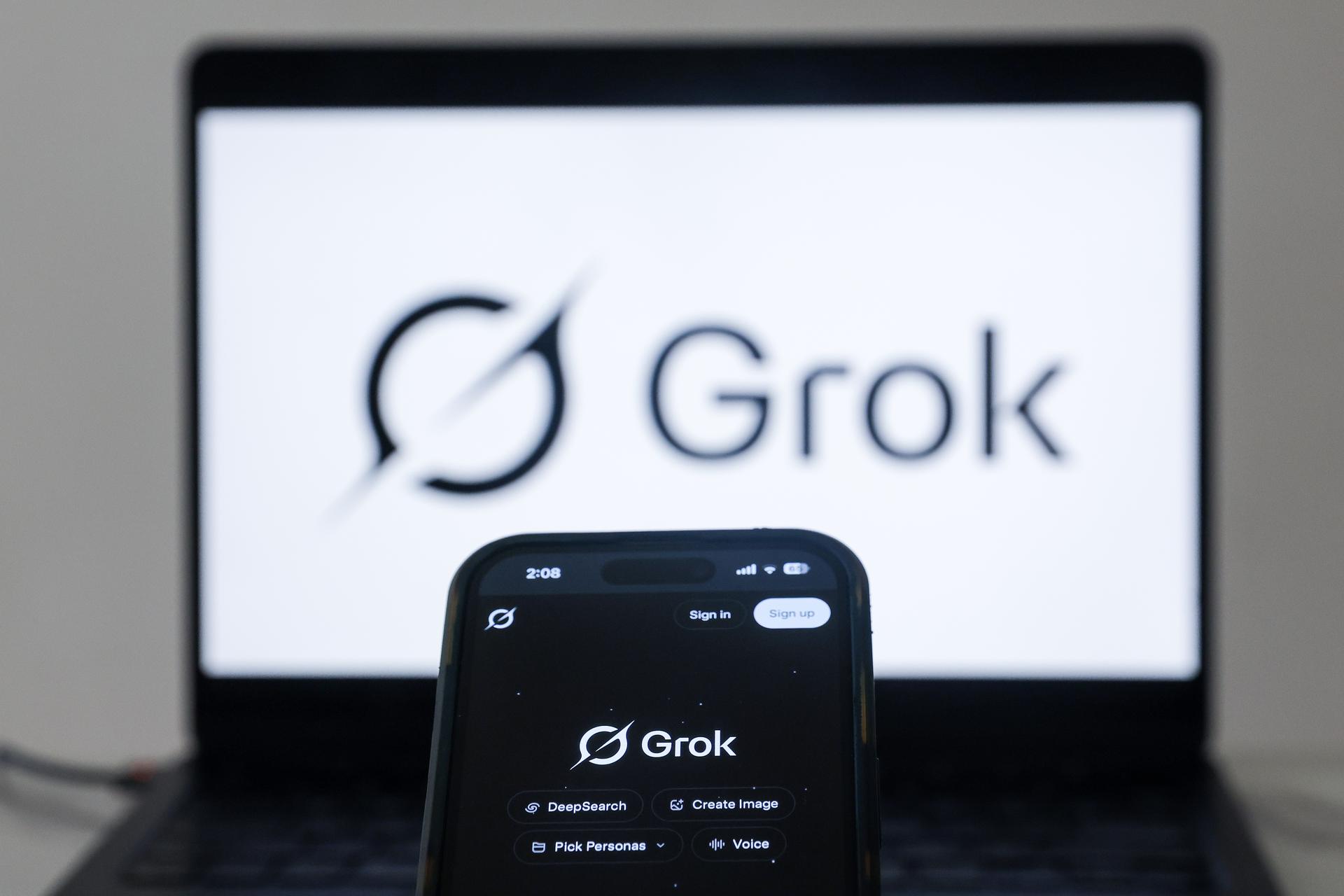 Shah Alam (Malaysia), 12/01/2026.- The Grok artificial intelligence (AI) website is displayed on a mobile phone as a nationwide restriction on the service takes effect, in Shah Alam, outside Kuala Lumpur, Malaysia 12 January 2026. The Malaysian Communications and Multimedia Commission (MCMC) ordered a temporary block on the tool starting 11 January, citing its 'repeated misuse' to generate non-consensual sexually explicit images and 'grossly offensive' content. According to the regulator, the action was taken after social media platform X and xAI, the start-up behind Grok, failed to implement adequate technical safeguards despite multiple formal notices. (Malasia) EFE/EPA/FAZRY ISMAIL