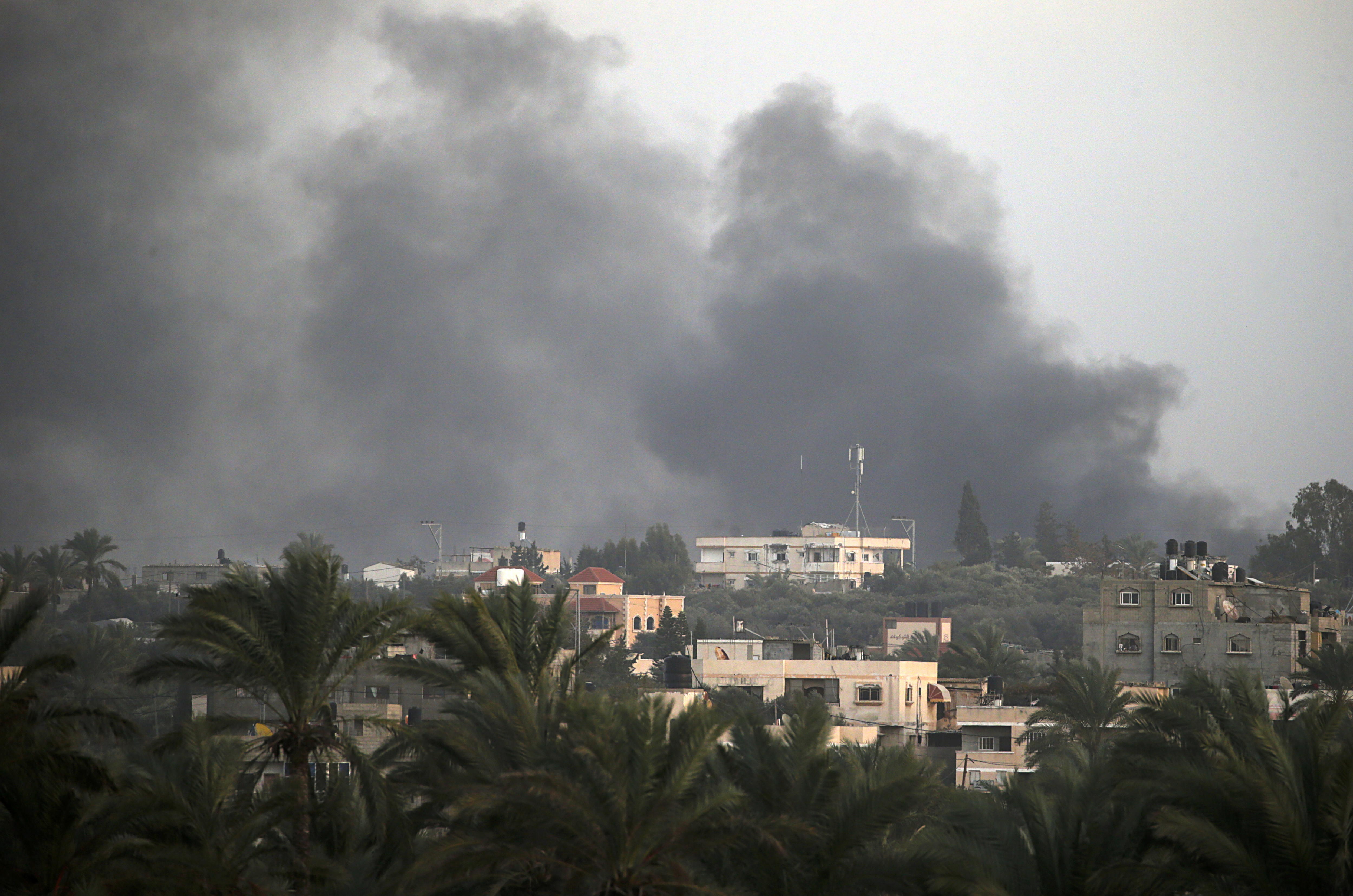 Southern Gaza Strip (---), 09/01/2024.- Smoke rises during Israeli military operations in Al Maghazi, Al Bureije and Al Nusairat refugee camps, southern Gaza Strip, 09 January 2024. More than 22,800 Palestinians and at least 1,300 Israelis have been killed, according to the Palestinian Health Ministry and the Israel Defense Forces (IDF), since Hamas militants launched an attack against Israel from the Gaza Strip on 07 October, and the Israeli operations in Gaza and the West Bank which followed it. EFE/EPA/MOHAMMED SABER