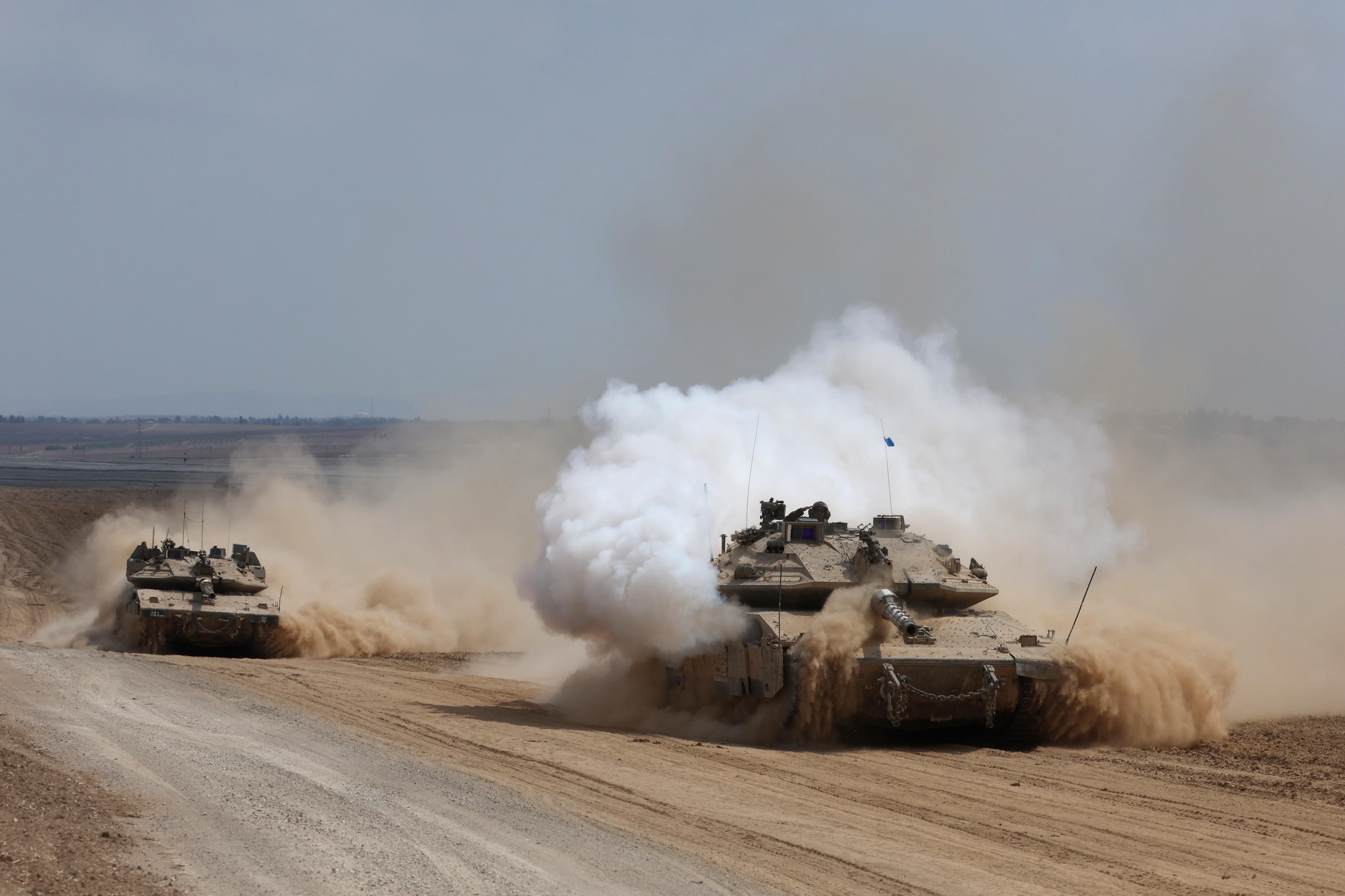 Undisclosed (Israel), 06/10/2024.- Israeli armoured fighting vehicles make their way to the northern Gaza Strip, as seen from the border with Gaza in southern Israel, 06 October 2024. Israel's military stated on 06 October, they have been conducting since last night an 'operation to systematically dismantle terrorist infrastructure' in the area of Jabalia, in the northern Gaza Strip. The Israel Air Force conducted strikes on dozens of military targets in order to assist IDF ground troops operating in the area, the statement added. (Terrorista) EFE/EPA/ABIR SULTAN
