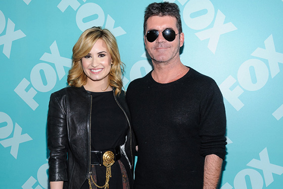 Demi Lovato está emocionada por ser la madrina del primer hijo de Simon Cowell