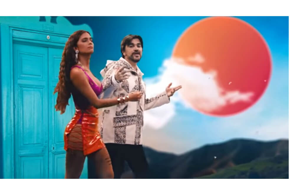 Greeicy Rendón y Juanes en el video de “Minifalda”.