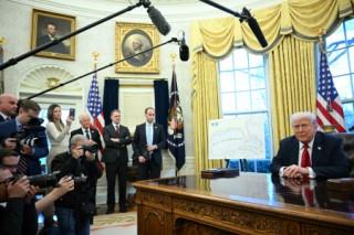 US President Donald Trump announces tariffs on auto imports in the Oval Office of the White House in Washington, DC, on March 26, 2025.