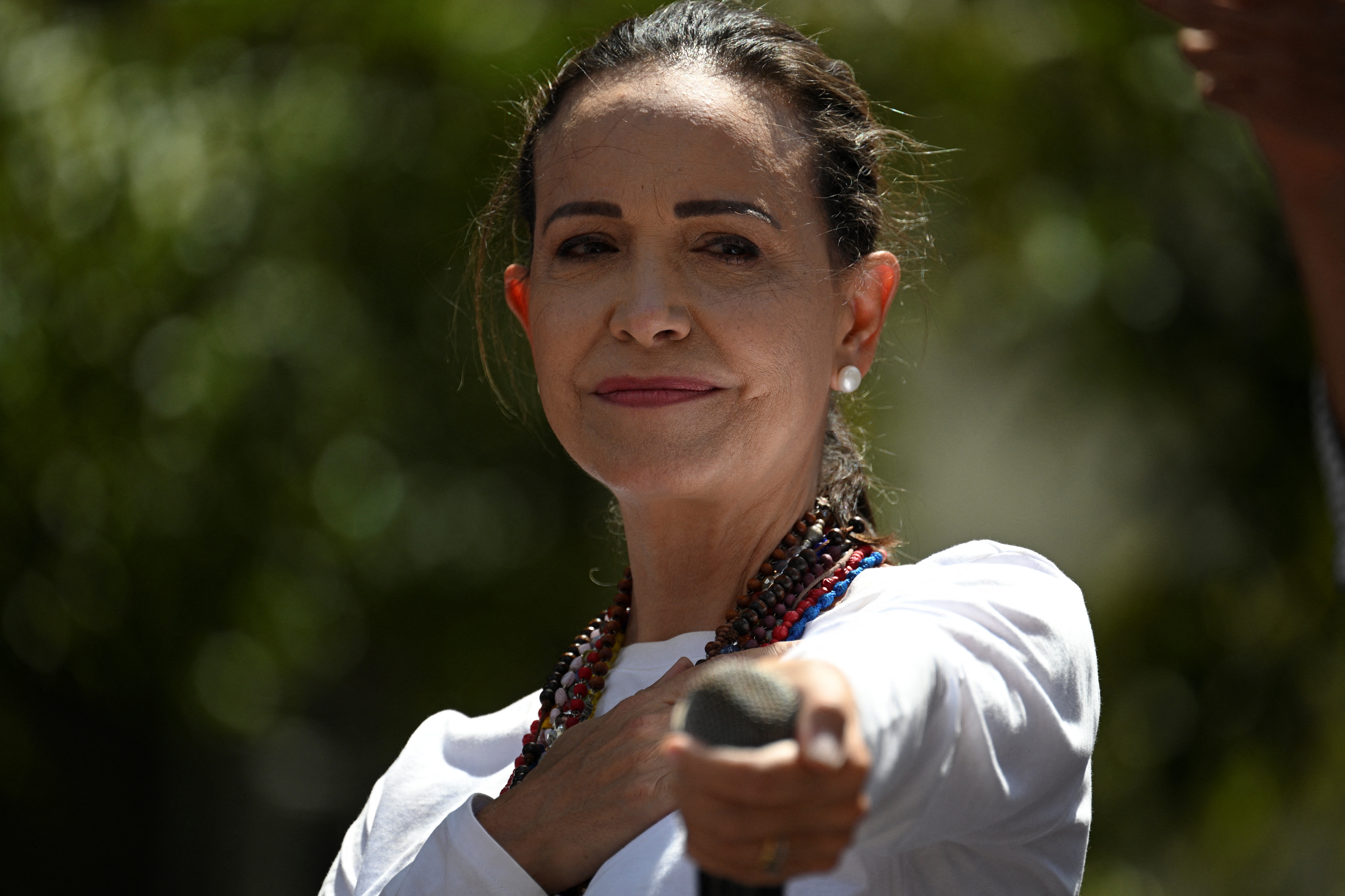 (FILES) Venezuelan opposition leader Maria Corina Machado gestures during a demonstration to protest over the presidential election results, in Caracas on August 3, 2024.