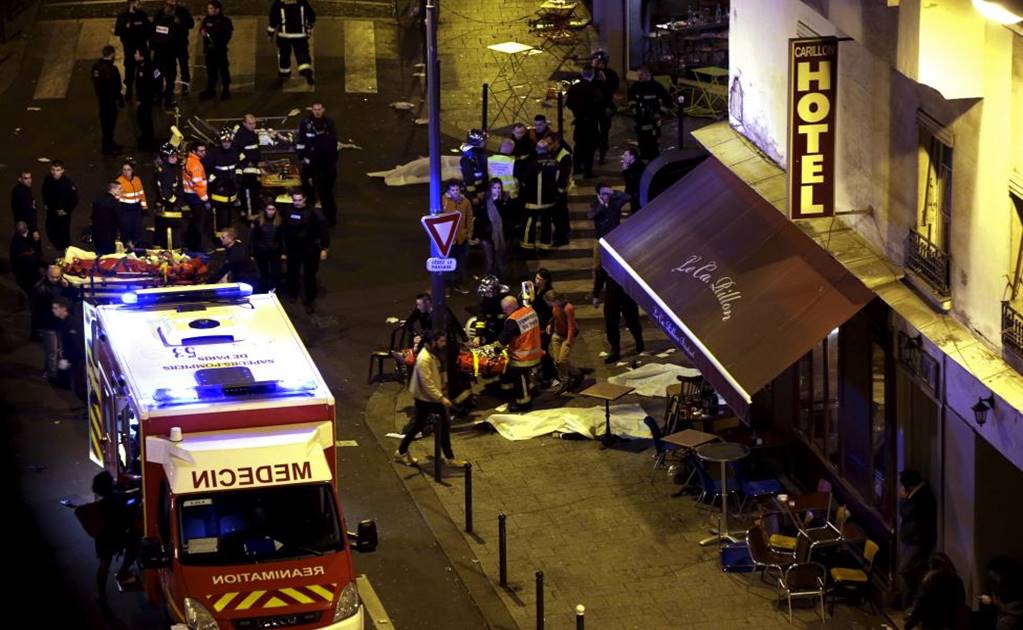 At least 60 dead in Paris shootings, hostages held: French media