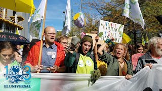 Activistas presionan a gobiernos en marchas contra cambio climático