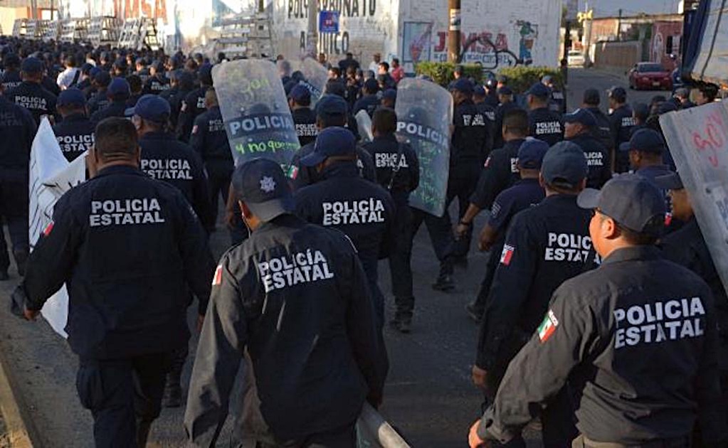 Salen de prisión 15 policías acusados de robar rancho en Oaxaca