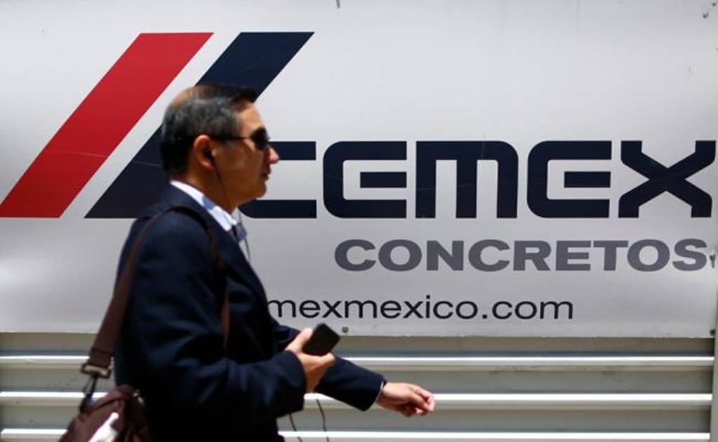 Cemex says strong dollar may delay higher debt rating