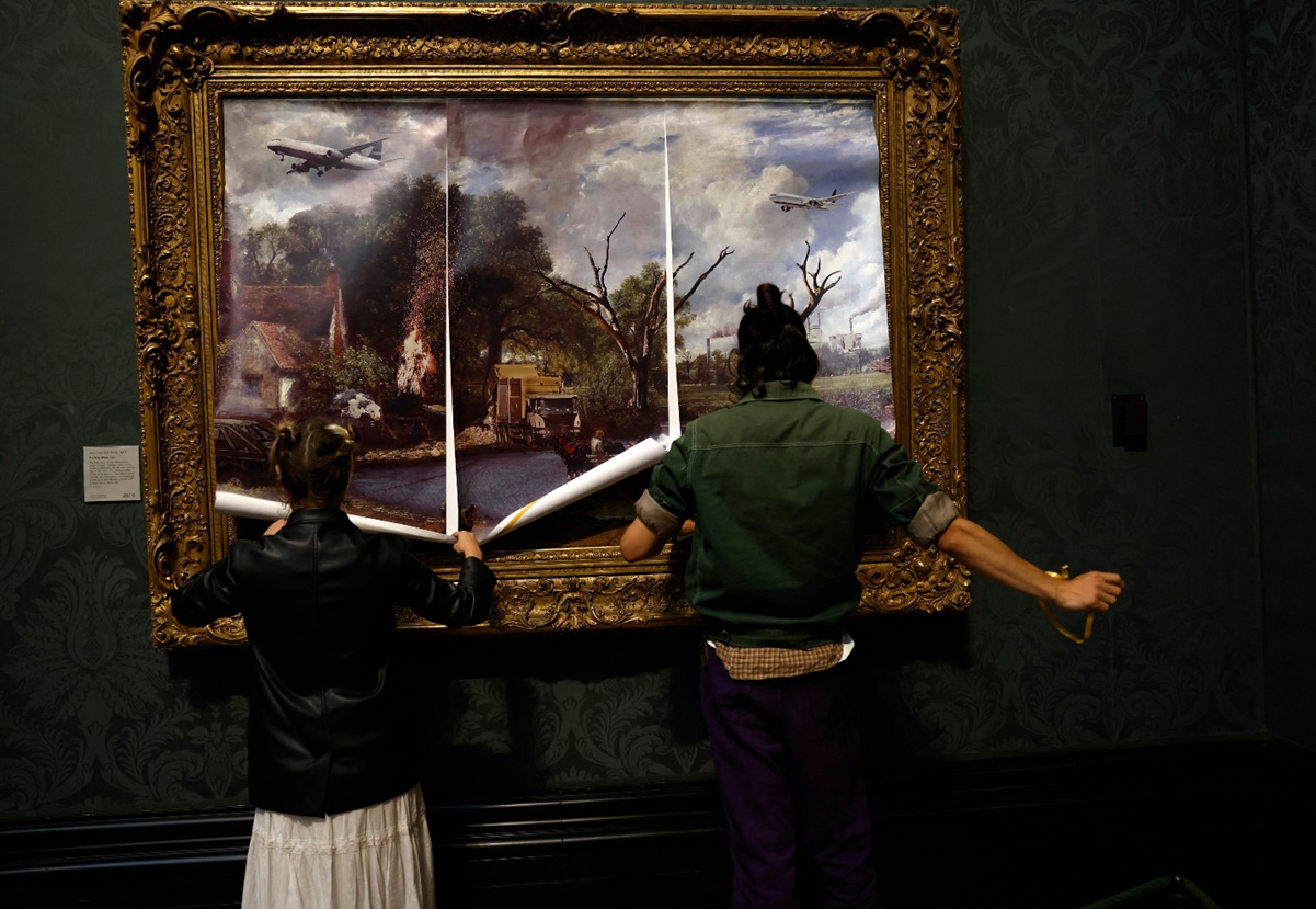 Activistas climáticos se pegan a un cuadro en la National Gallery