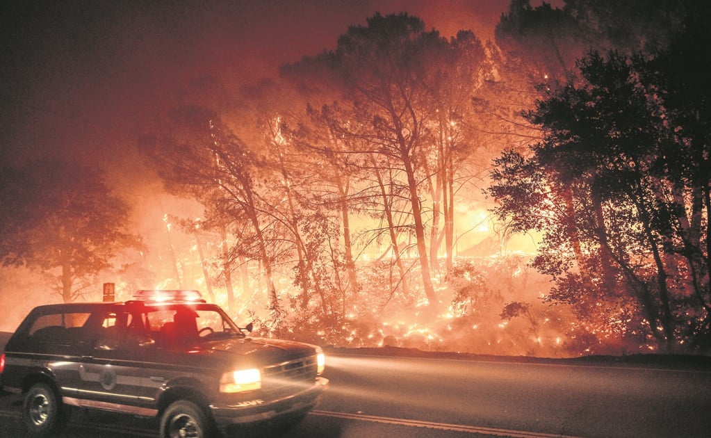 California wildfires: Flames scorch roads in fires caused by lightning strikes