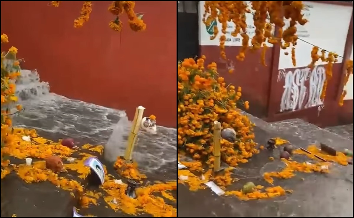 VIDEO: En 15 minutos, lluvia arrastra el altar de muertos más grande de Michoacán 