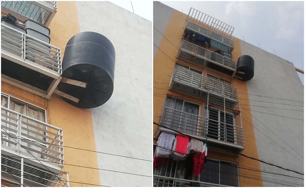 ¡No es broma! Cuelgan tinaco en balcón de Iztacalco; vecinos advierten peligro