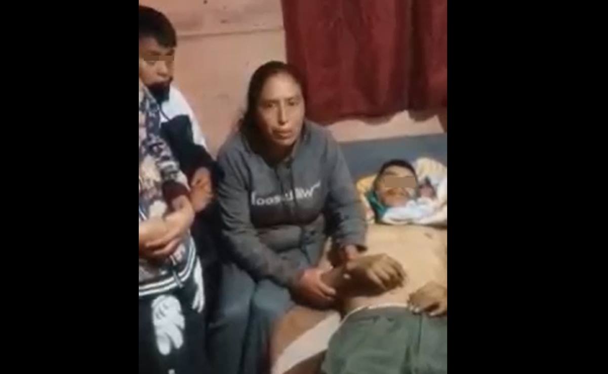 Video. Con el cadáver a un lado, mujer denuncia el homicidio de su esposo en Michoacán